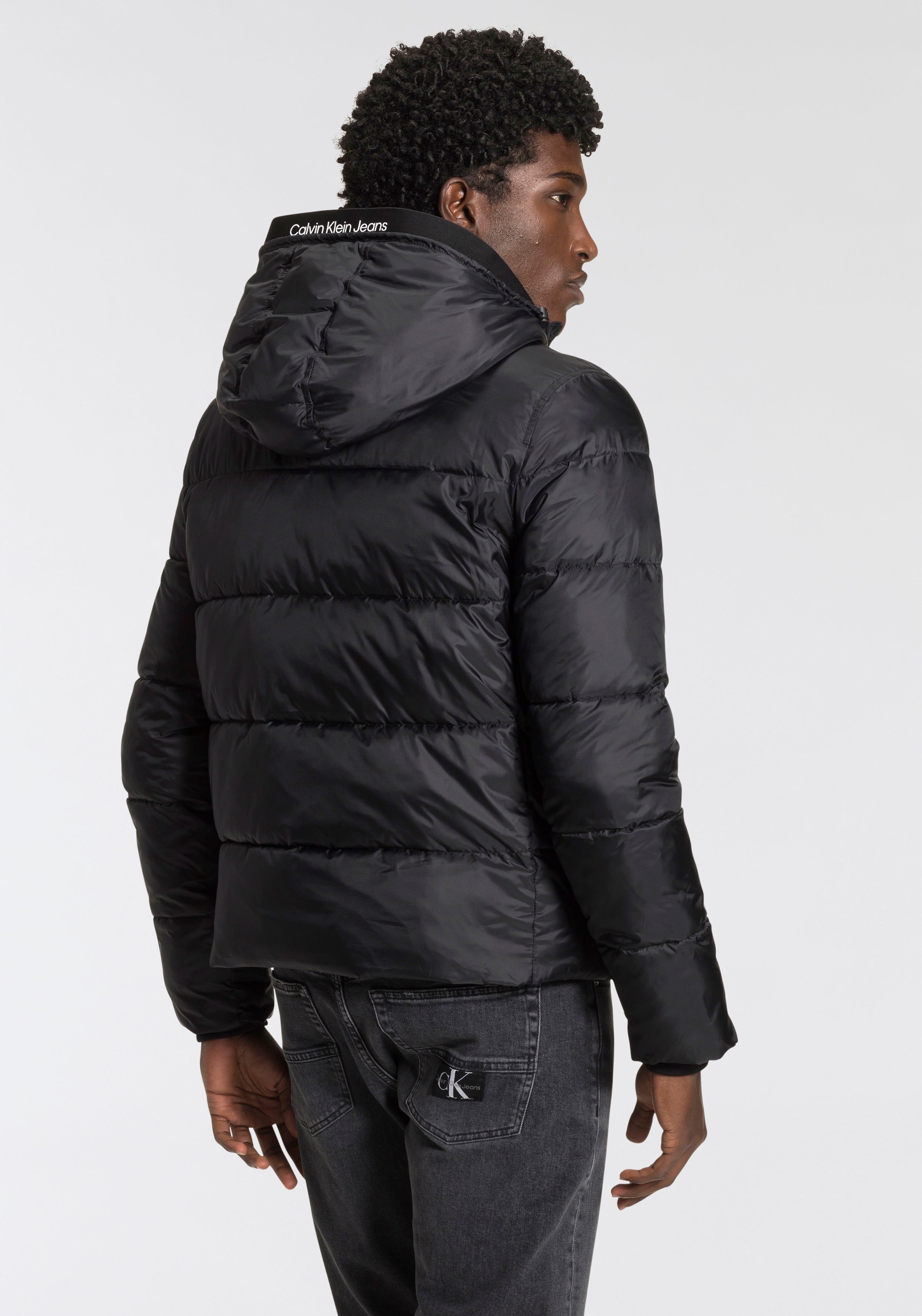 Calvin Klein Jeans Steppjacke »LOGO TAPE LW PADDED JACKET«, mit Kapuze