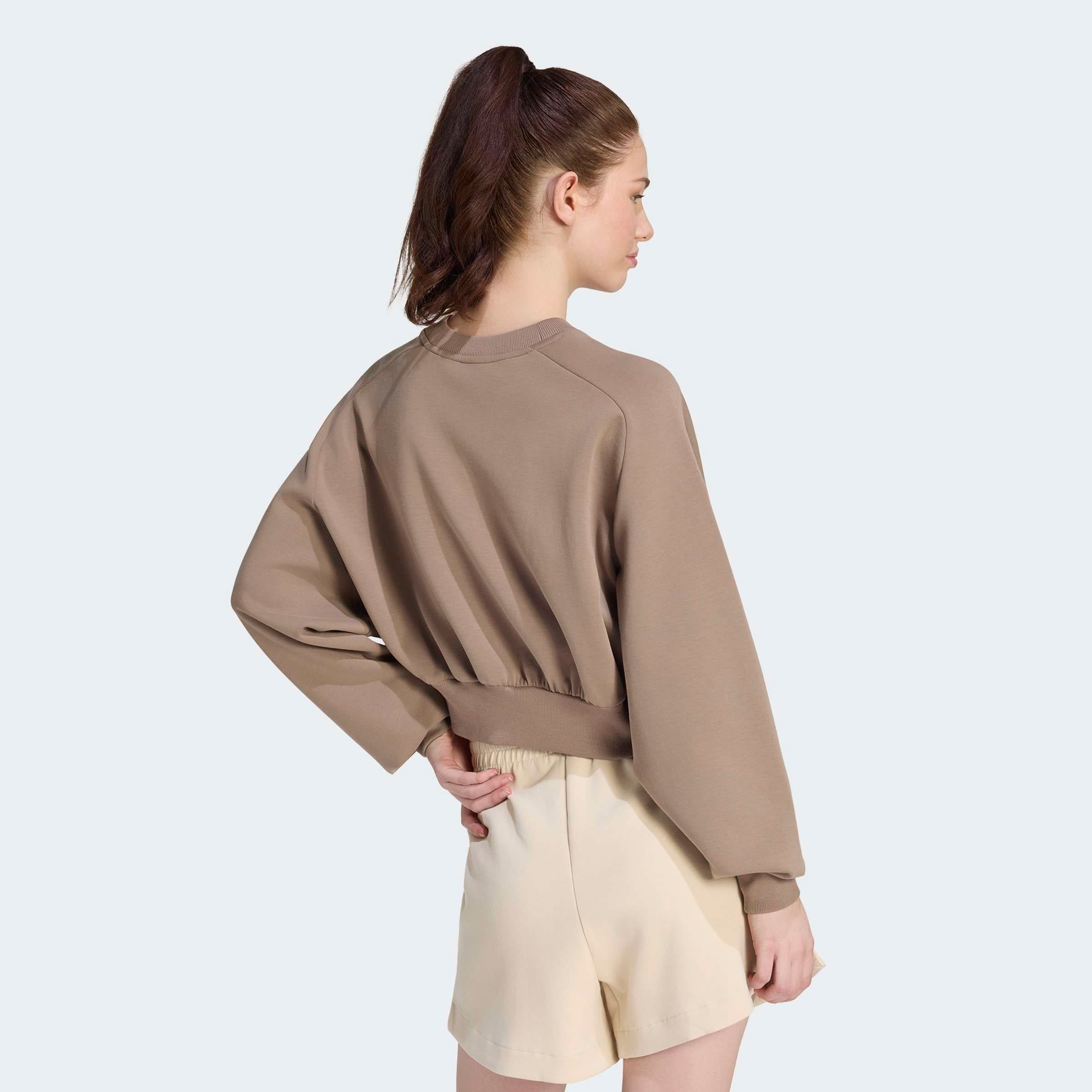 adidas Sportswear Sweatshirt »W ALL SZN SL SW«, mit angesetztem Bündchen, aus weichem, leichtem Material
