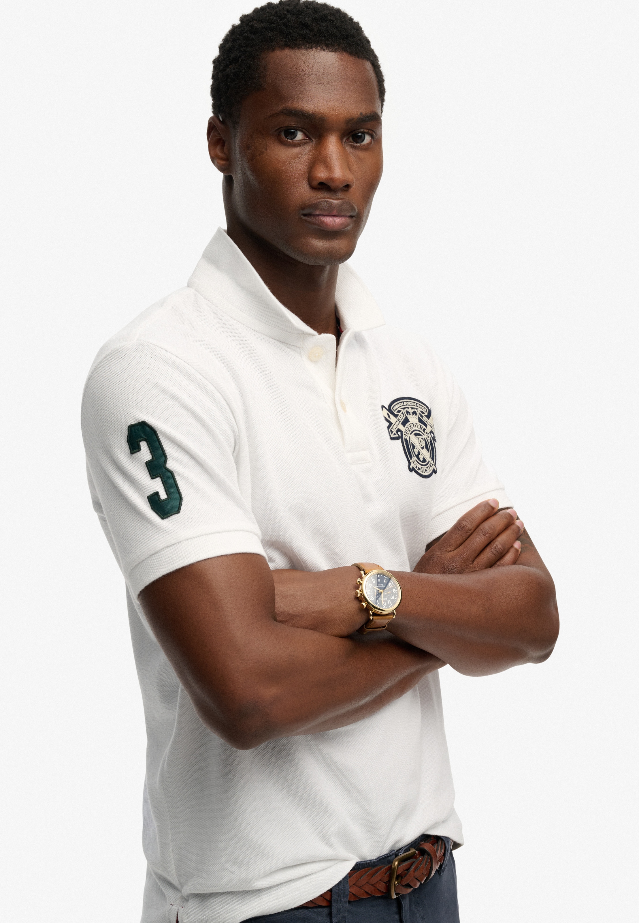 Superdry Poloshirt »CREST POLO« mit Markenlabel, aus Baumwolle, Relaxed Fit, bedruckte Optik