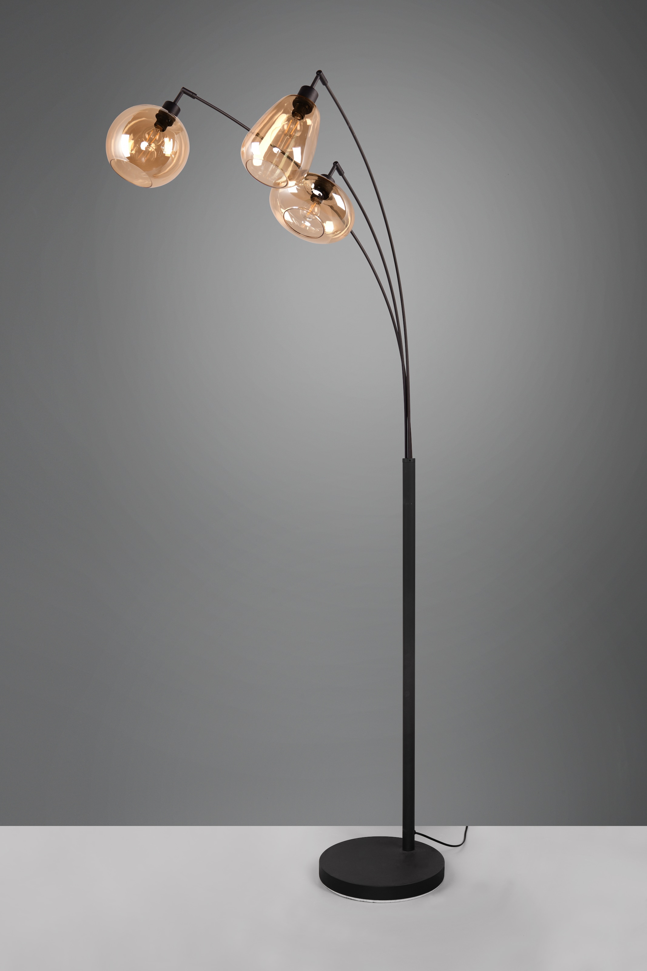 TRIO Leuchten Stehlampe »Lumina, gebogene Stehleuchte mit Glasschirmen exkl 3xE14 max 10W« E14 1 Stk. warmweiß - kaltweiß amberfarbige Gläser in 3 Formen, Fußschalter, Bogenleuchte Höhe 200 cm