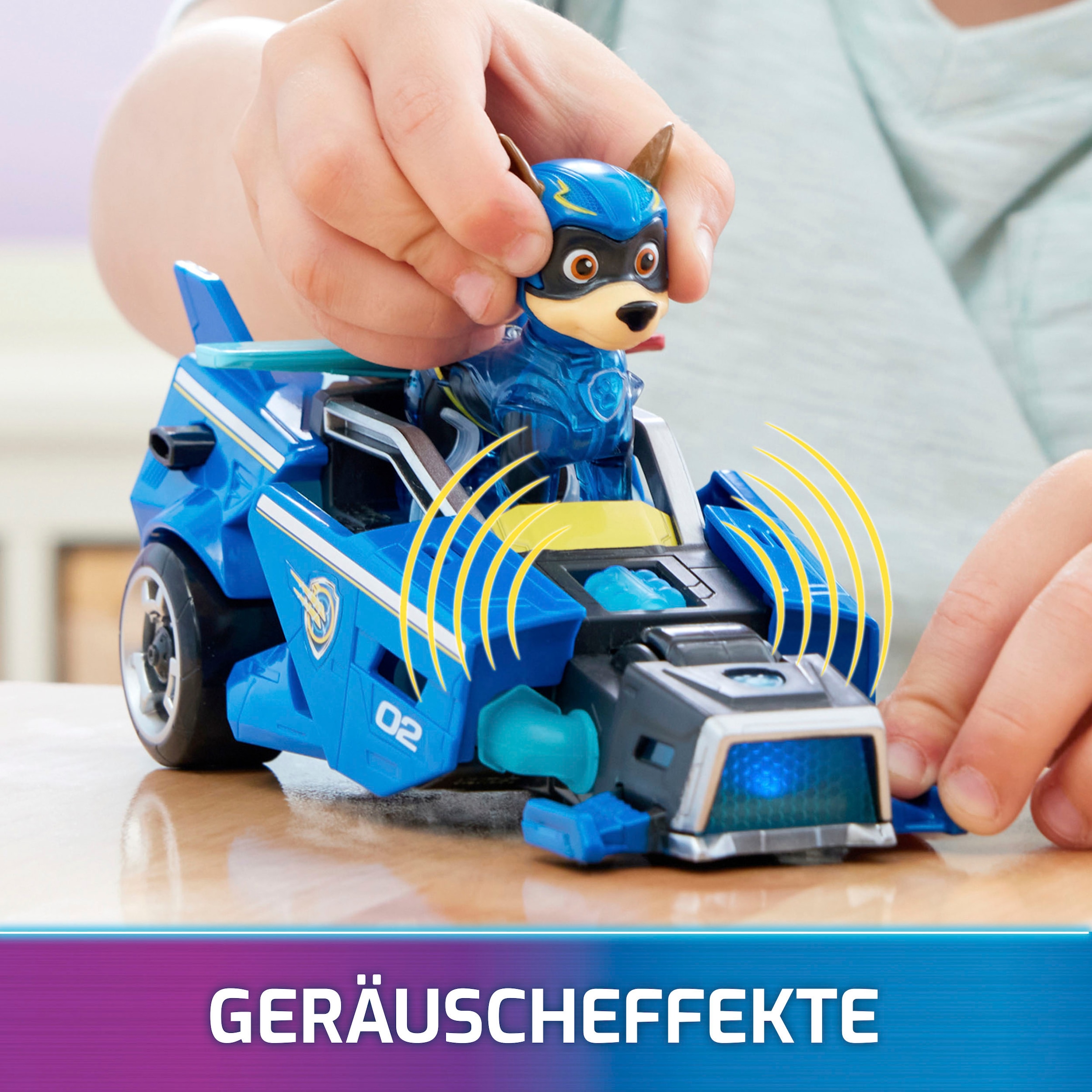 Spin Master Spielzeug-Auto »Paw Patrol - Movie II - Basic Themed Vehicles Chase«, Polizeiauto mit Welpenfigur, Licht- und Soundeffekt