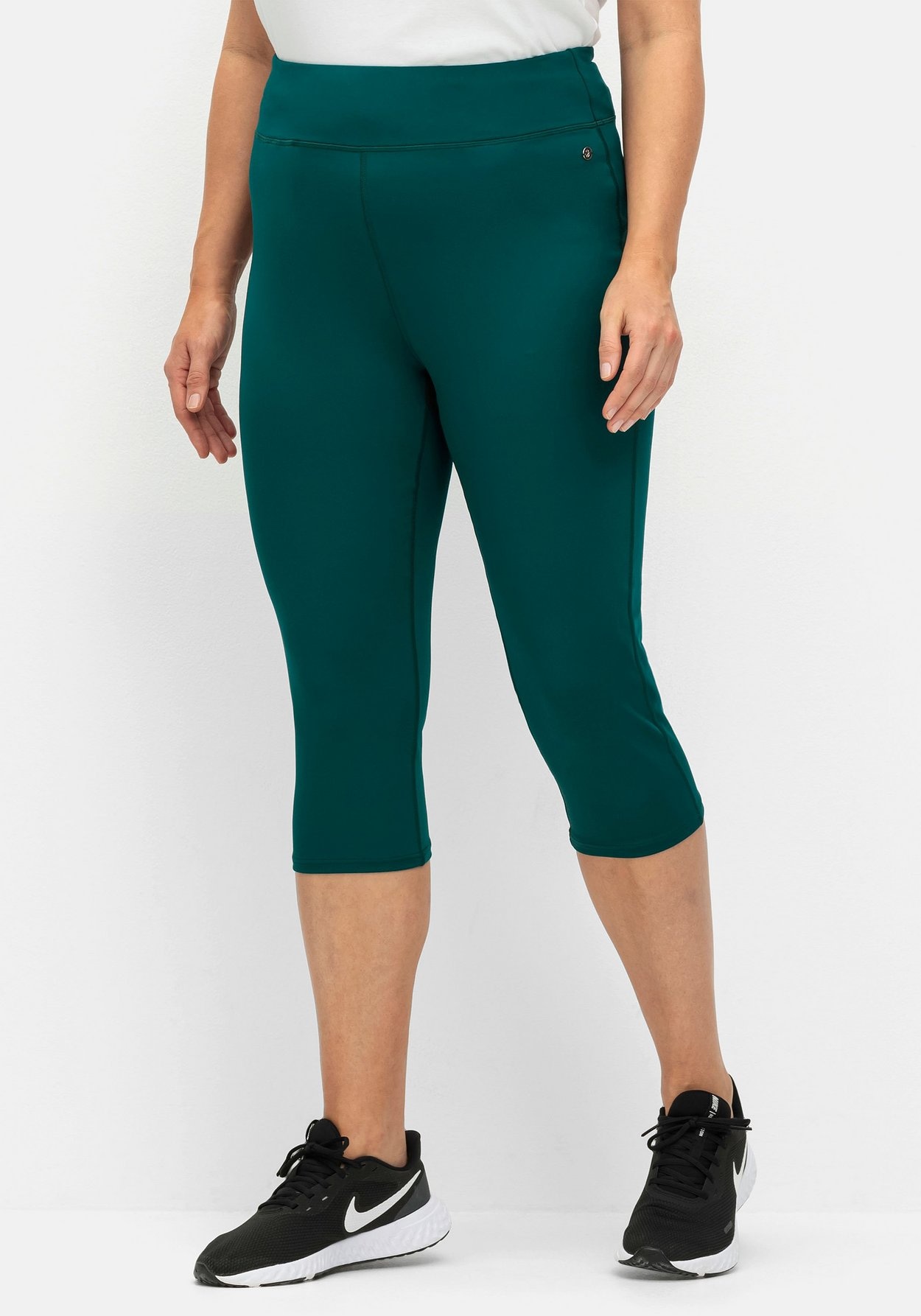 Sheego Sporthose »Caprihose aus Funktionsqualität, mit Innentasche«