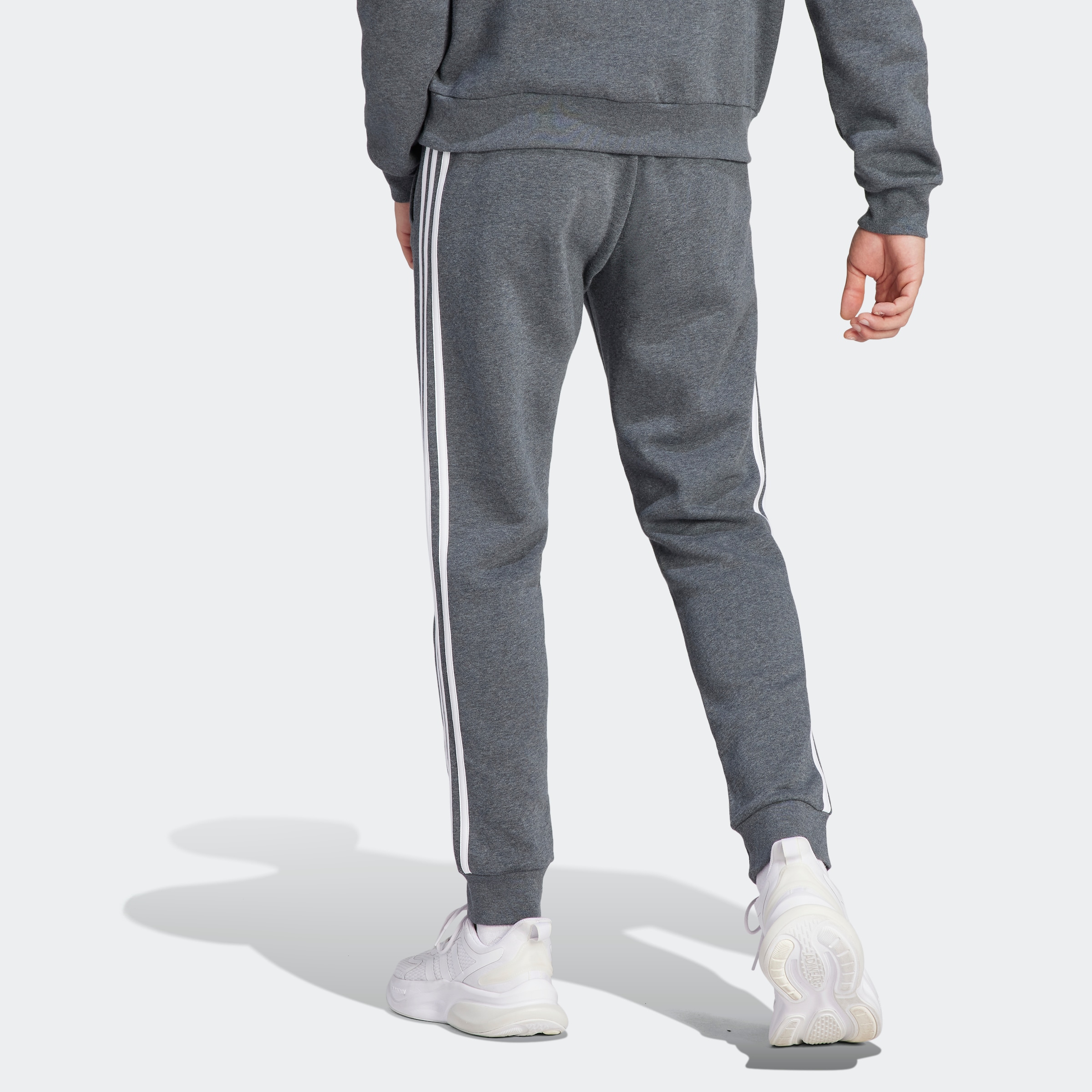 adidas Sportswear Sporthose »ESSENTIALS 3STREIFEN TAPERED CUFF HOSE«, (1 tlg.), Jogginghose aus Baumwollmix