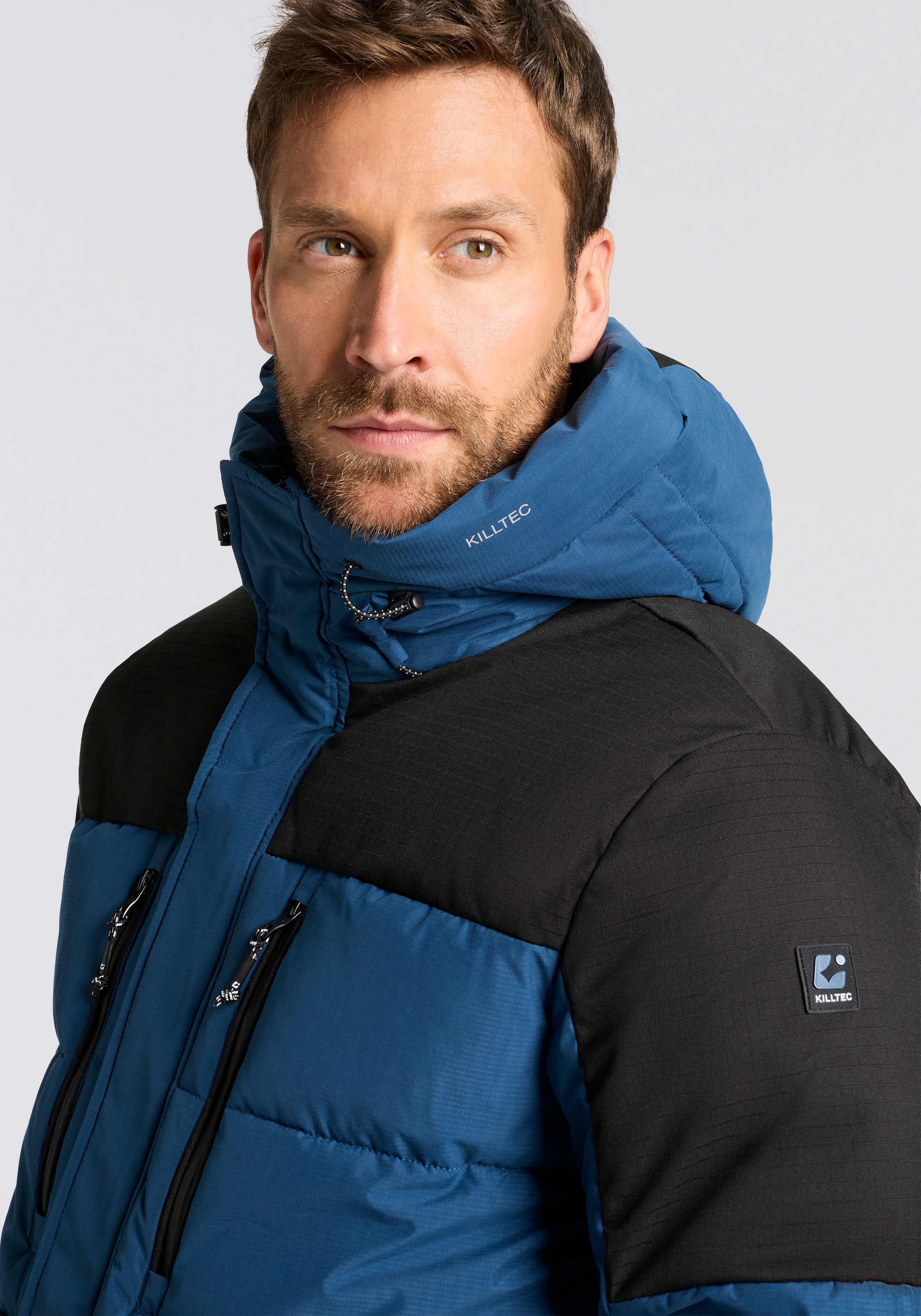 Killtec Steppjacke »KOW 88 MN QLTD JCKT« wasserabweisend, winddicht, atmungsaktiv, mit verstellbarer Kapuze