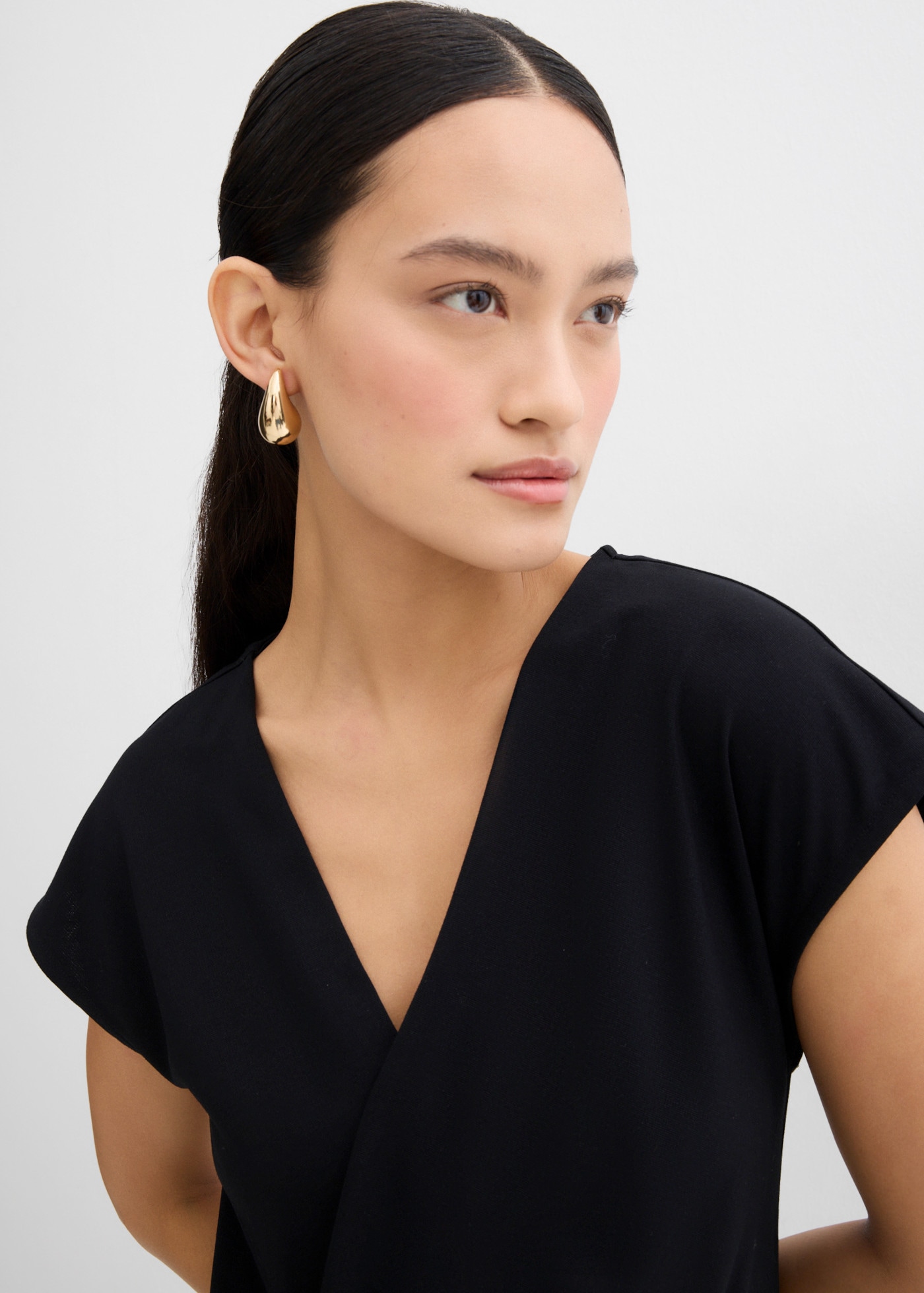 bonprix Shirttop ärmelloses Design, mit V-Ausschnitt, Slim Fit Passform