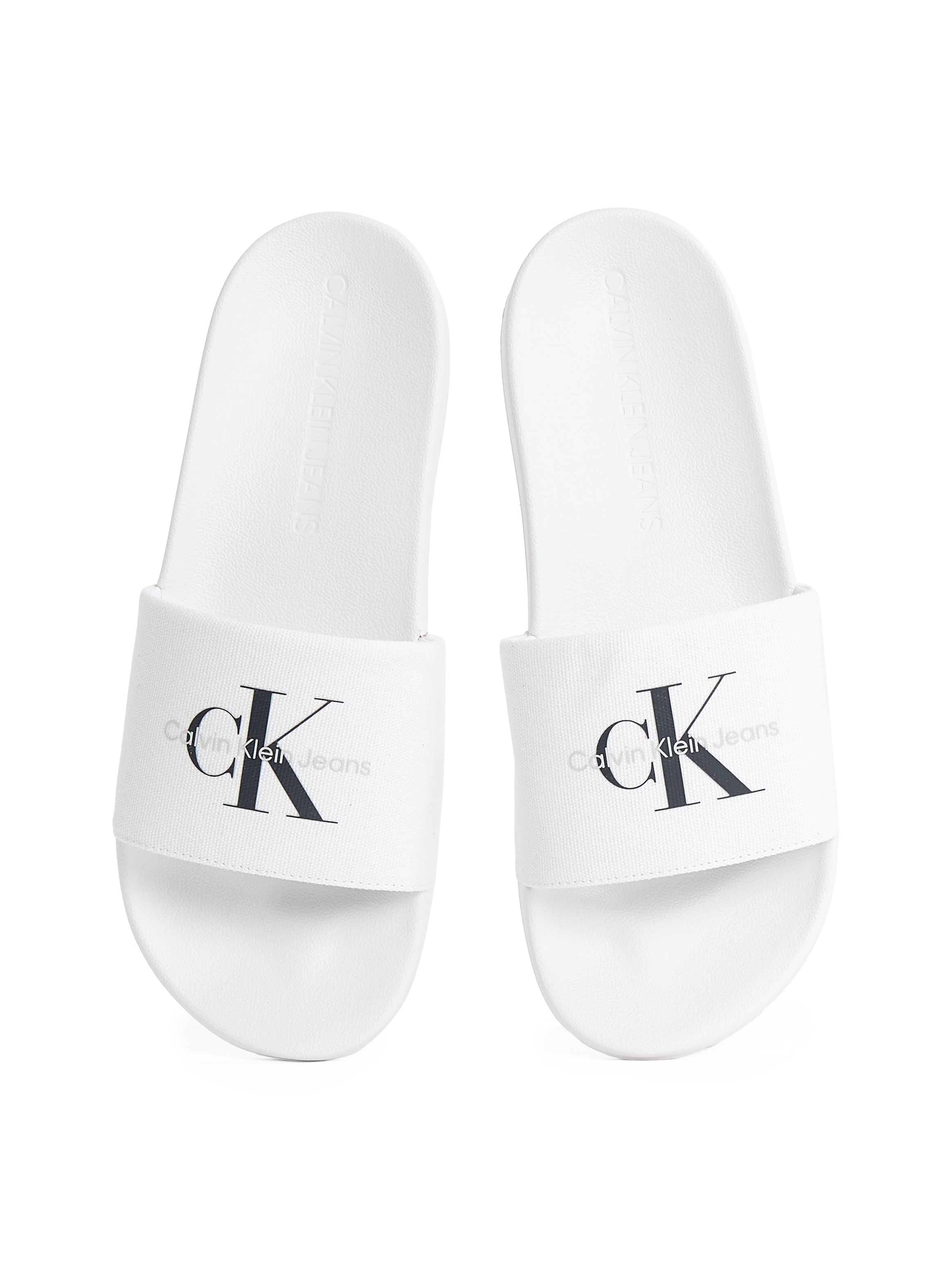 Calvin Klein Jeans Badepantolette »SLIDE MONOGRAM«, Sommerschuh, Schlappen, Poolslides, Strandschuh mit Logoschriftzug