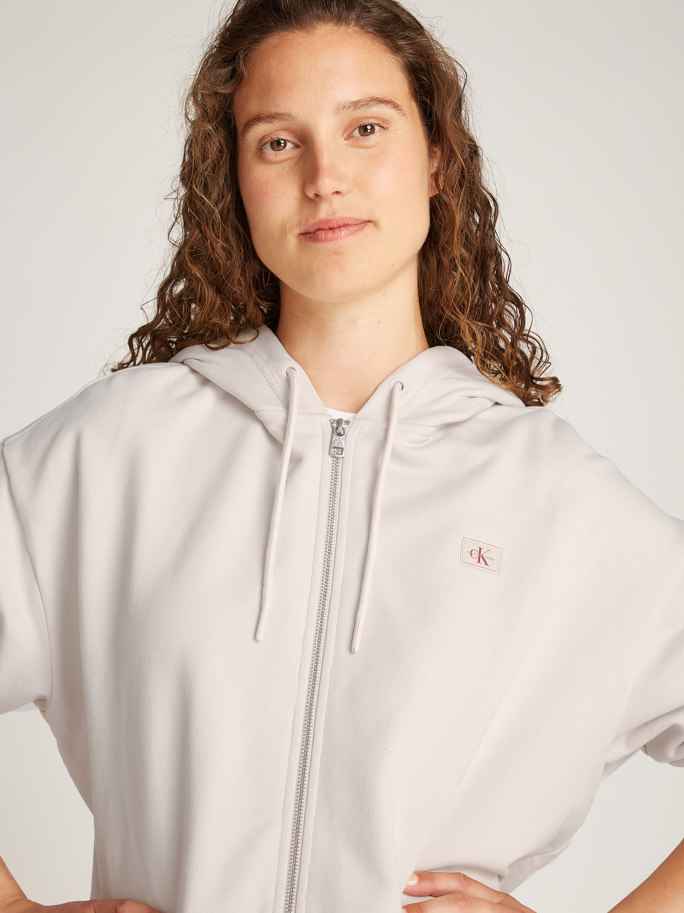 Calvin Klein Jeans Sweatjacke »WOVEN LABEL ZIP-THROUGH«, mit Logo-Label