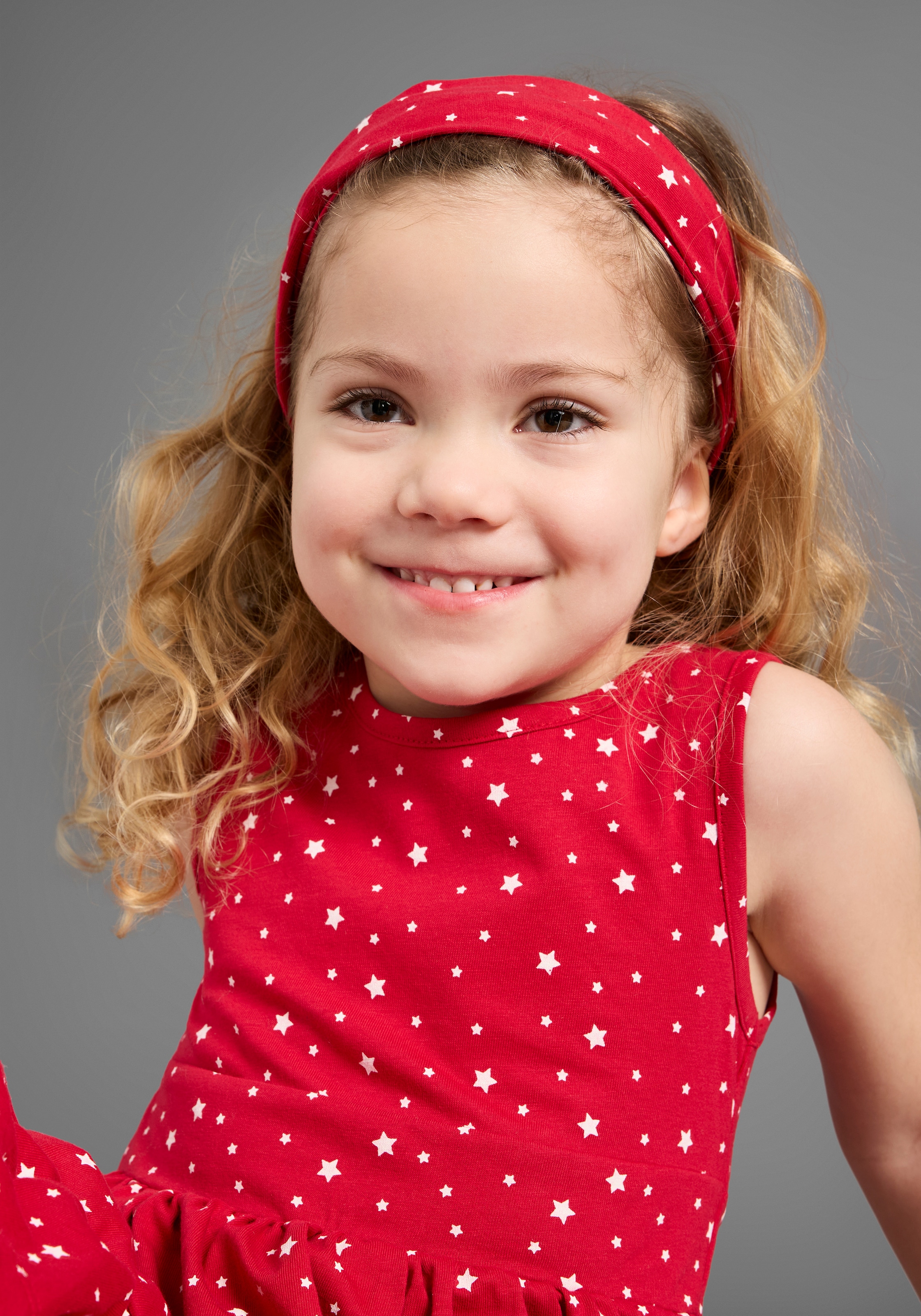 KIDSWORLD Jerseykleid »2tlg. Shirtkleid + Haarband im niedlichen Sternen-Allover«, (Set, 2 tlg.), festliche Anlässe, knielang, verspielter Stil, aus Baumwolle