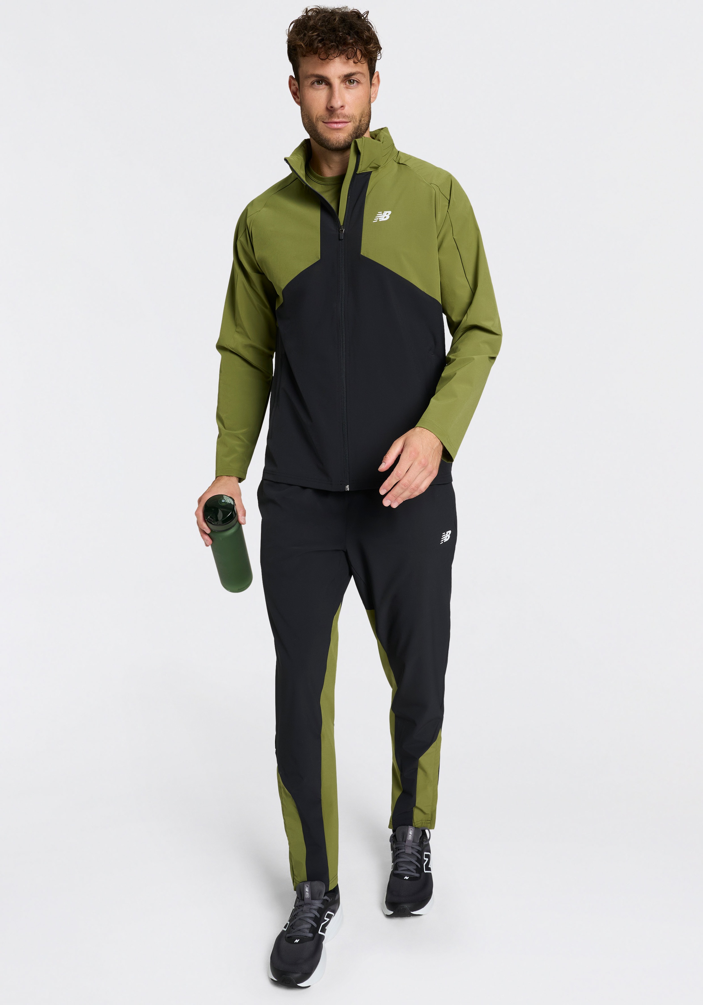 New Balance Trainingsjacke »UTILITY STRETCH WOVEN JACKET« Trainingsjacke für Fitness und sportliche Aktivitäten