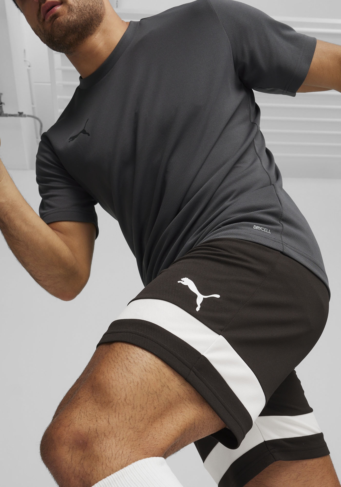 PUMA Trainingsshorts »INDIVIDUALRISE SHORTS«  für Sportmode, mit atmungsaktiven Mesh-Einsätzen, modernes Design