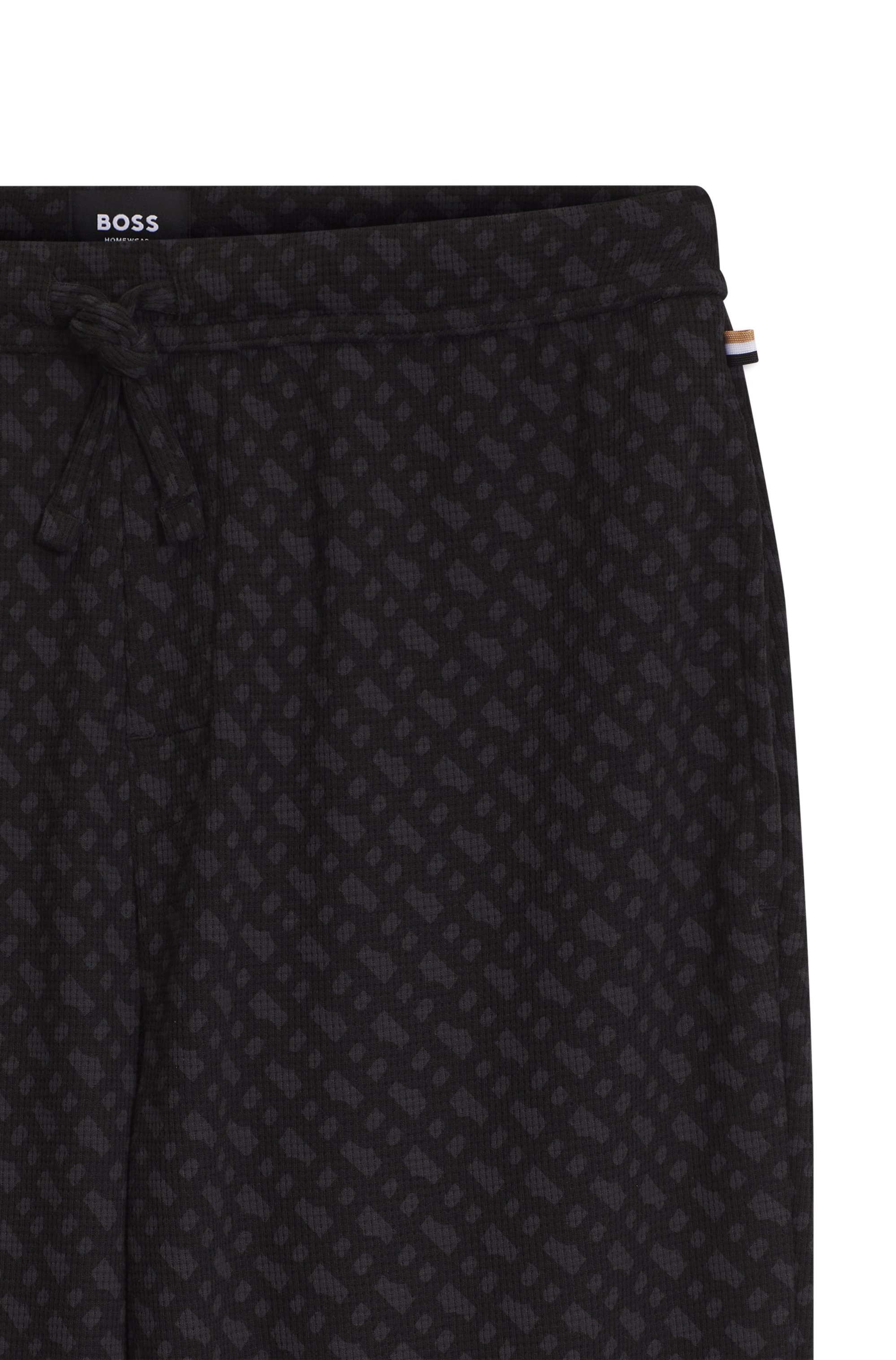 BOSS Pyjamahose »Waffle AOP Pants«  elastischer Bund mit Kordel, Seitentaschen, Allover-Druck