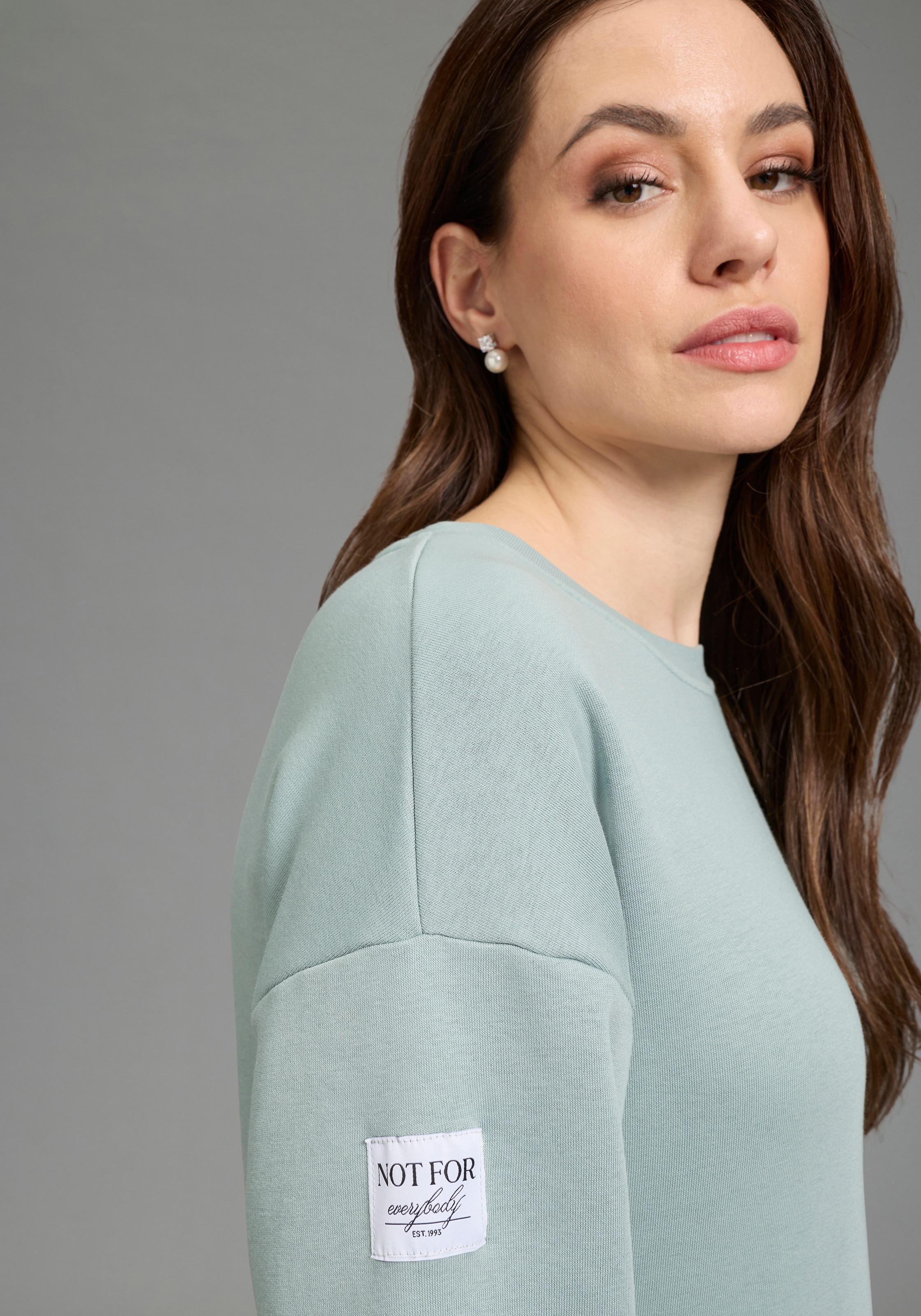 Bruno Banani Sweatshirt , mit Rundhalsausschnitt und platzierten Weblabels
