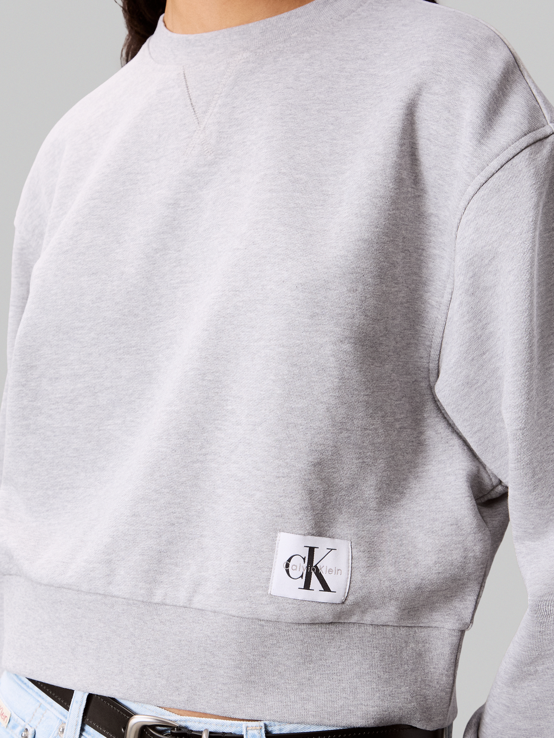 Calvin Klein Jeans Sweatshirt »FRENCH TERRY WOVEN LABEL CREW«, Regular fit mit Rundhalsausschnitt
