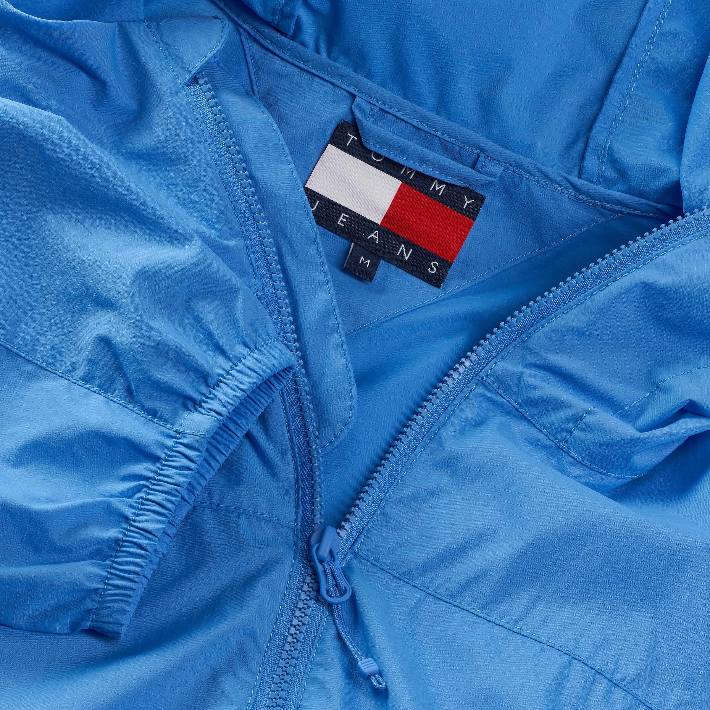 Tommy Jeans Outdoorjacke »TJM OUTDOOR SHELL JACKET EXT«, mit Kapuze, Mit Rundhalsausschnitt