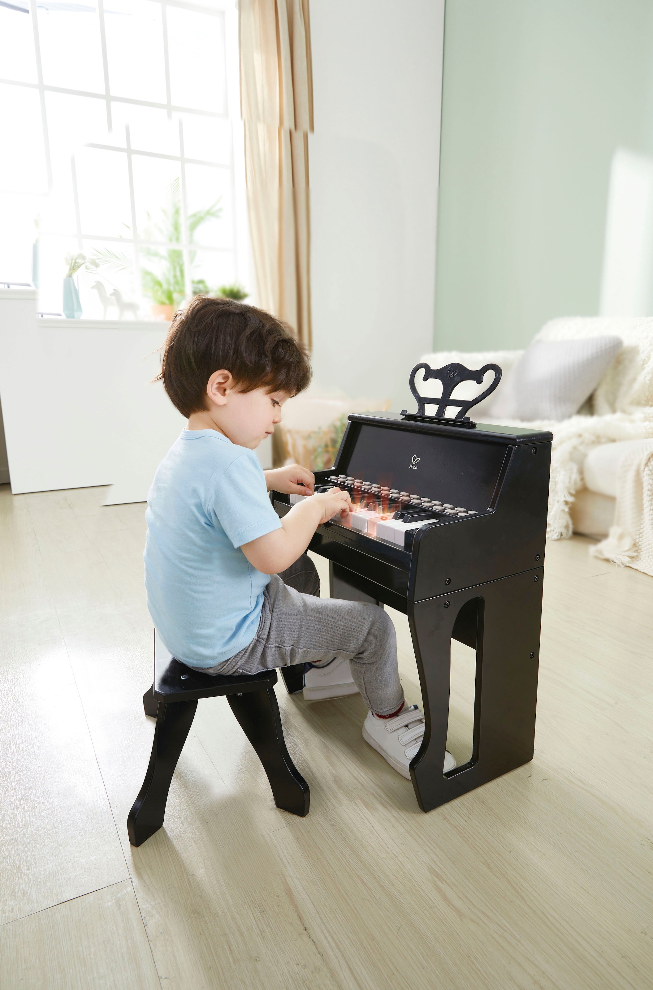 Hape Spielzeug-Musikinstrument »Leuchttasten-Piano mit Hocker«, FSC®- schützt Wald - weltweit