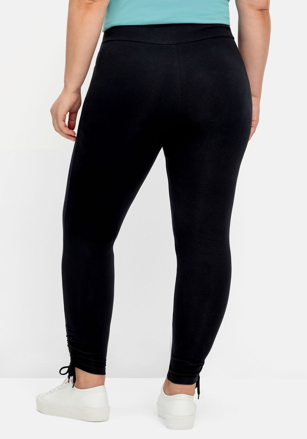 Sheego Leggings »Leggings mit breitem Bund und Raffung am Saum«