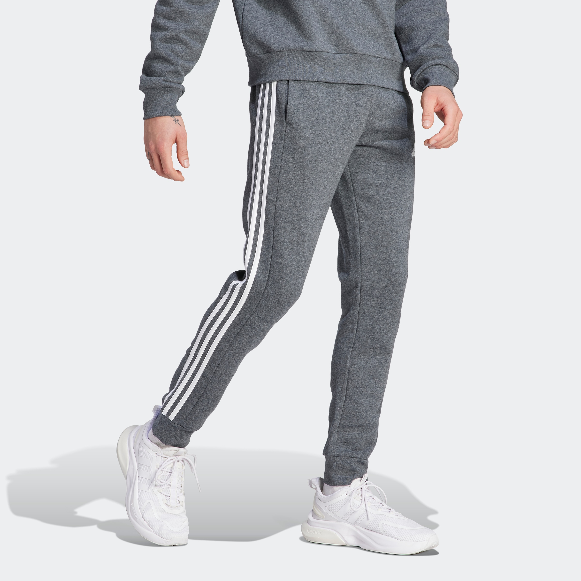 adidas Sportswear Sporthose »ESSENTIALS 3STREIFEN TAPERED CUFF HOSE«, (1 tlg.), Jogginghose aus Baumwollmix