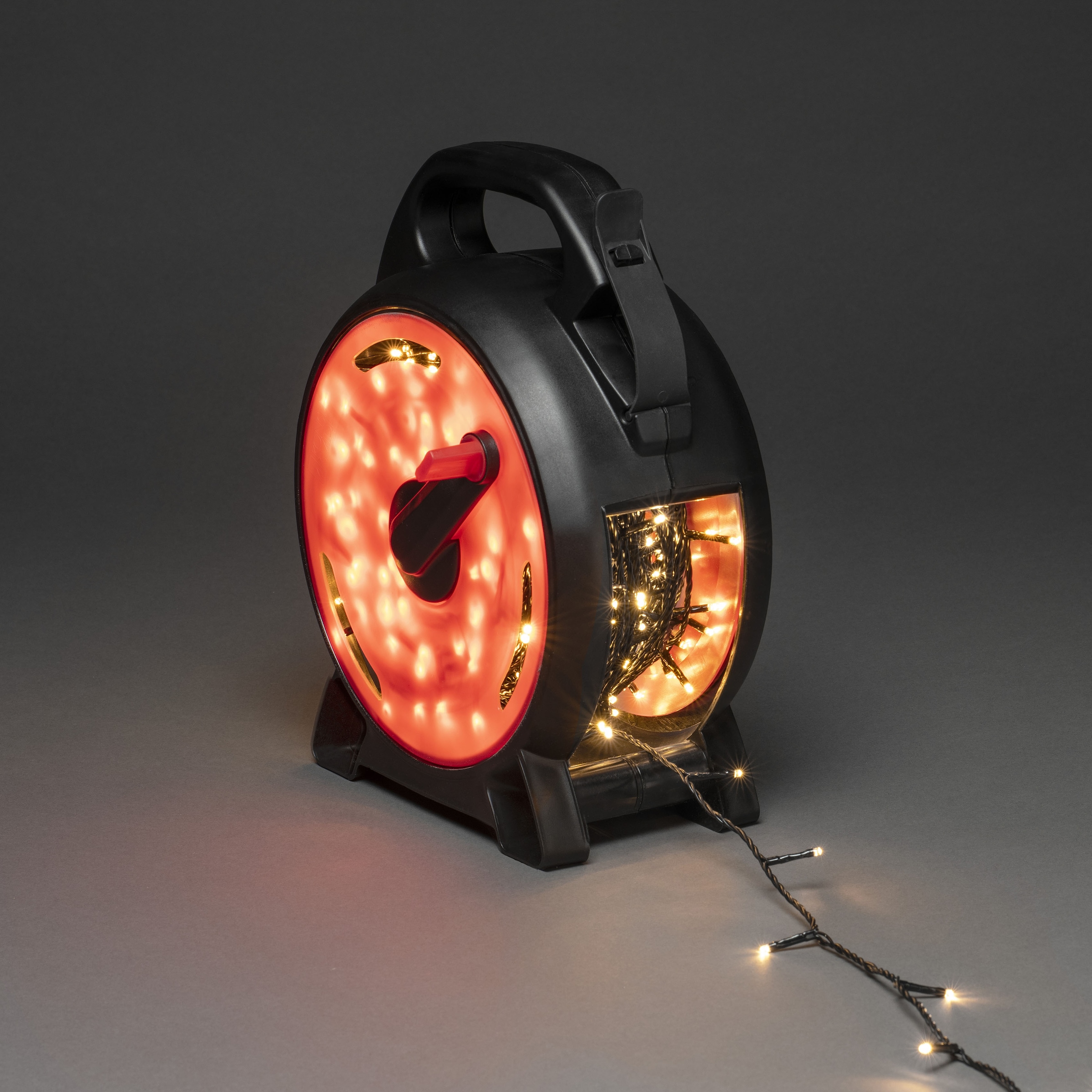 KONSTSMIDE LED-Lichterkette »Weihnachtsdeko aussen« 600 Stk.-flammig Micro LEDs mit Kabelaufroller, schwarz-rot, 600 warm weiße Dioden