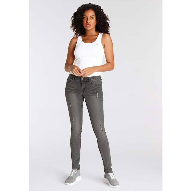 Arizona Skinny-fit-Jeans »mit Kontrastnähten und Pattentaschen«, Low Waist  bei ♕