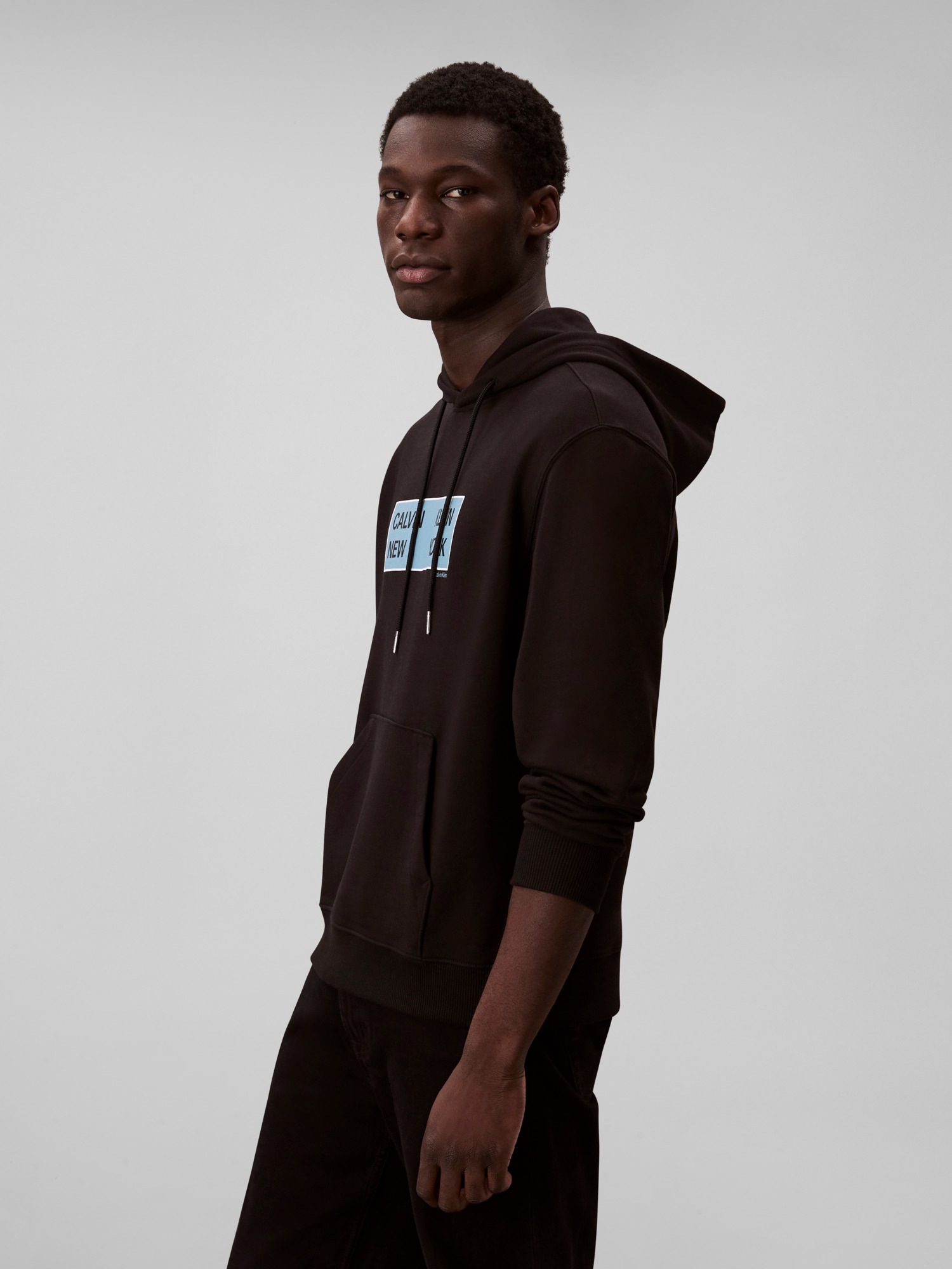 Calvin Klein Jeans Kapuzensweatshirt »LS EU 350TERRY CKNY BOX GRAPHIC« Mit Rundhalsausschnitt, regular fit