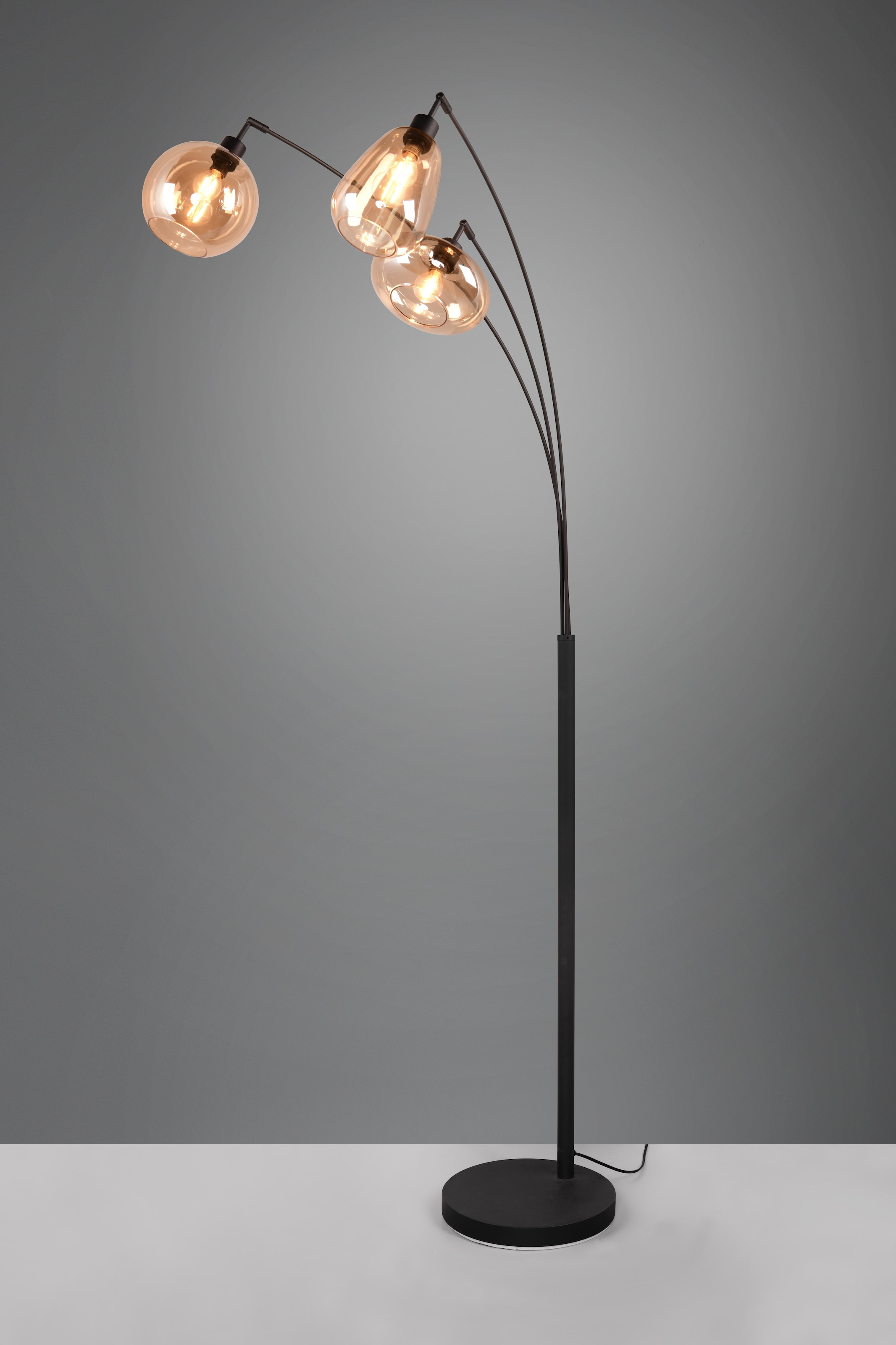 TRIO Leuchten Stehlampe »Lumina, gebogene Stehleuchte mit Glasschirmen exkl 3xE14 max 10W« E14 1 Stk. warmweiß - kaltweiß amberfarbige Gläser in 3 Formen, Fußschalter, Bogenleuchte Höhe 200 cm