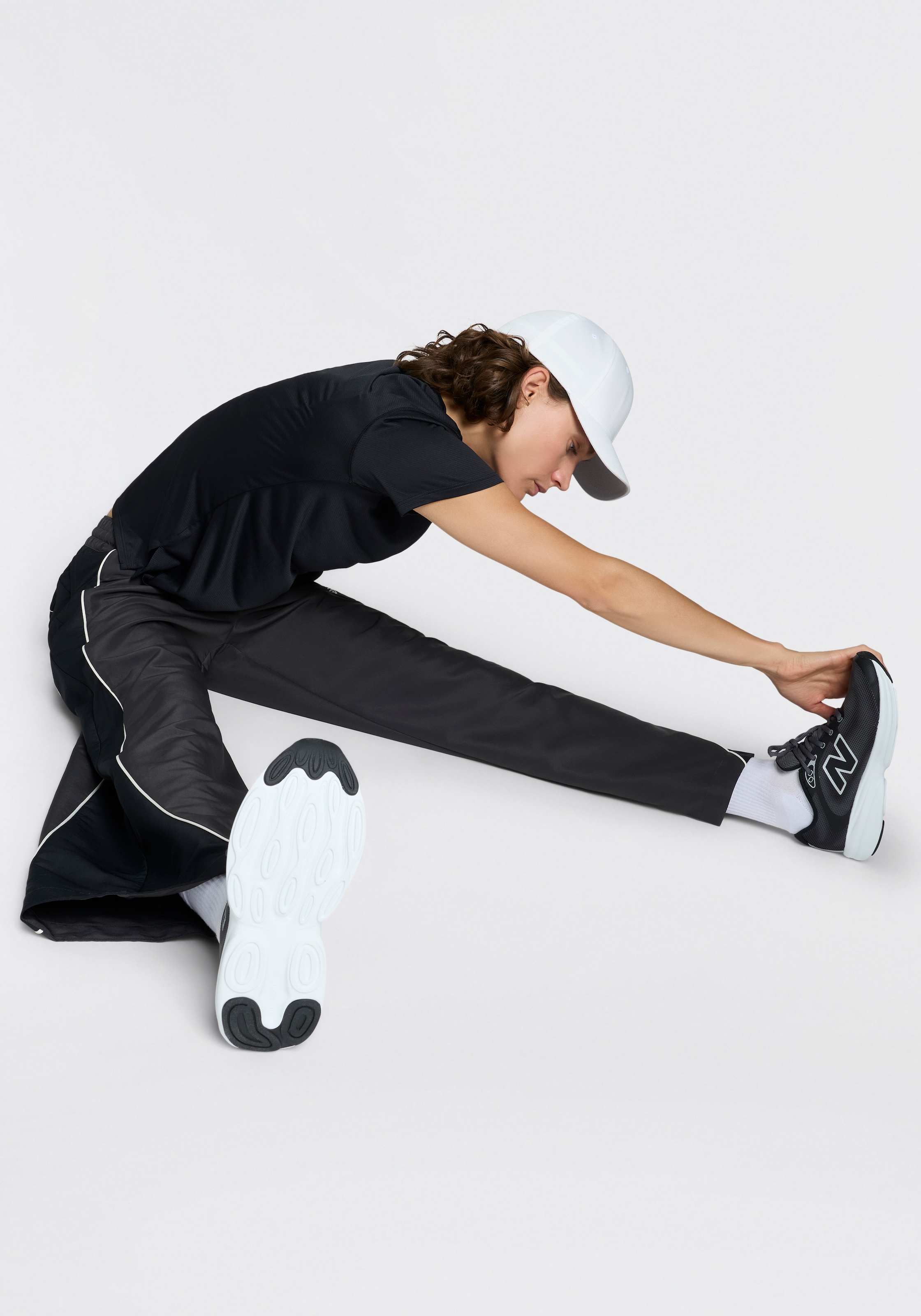 New Balance Trainingshose »TRACKSIDE WOVEN PANT«  für Erwachsene, mit bequemer Passform, normal-weite Form
