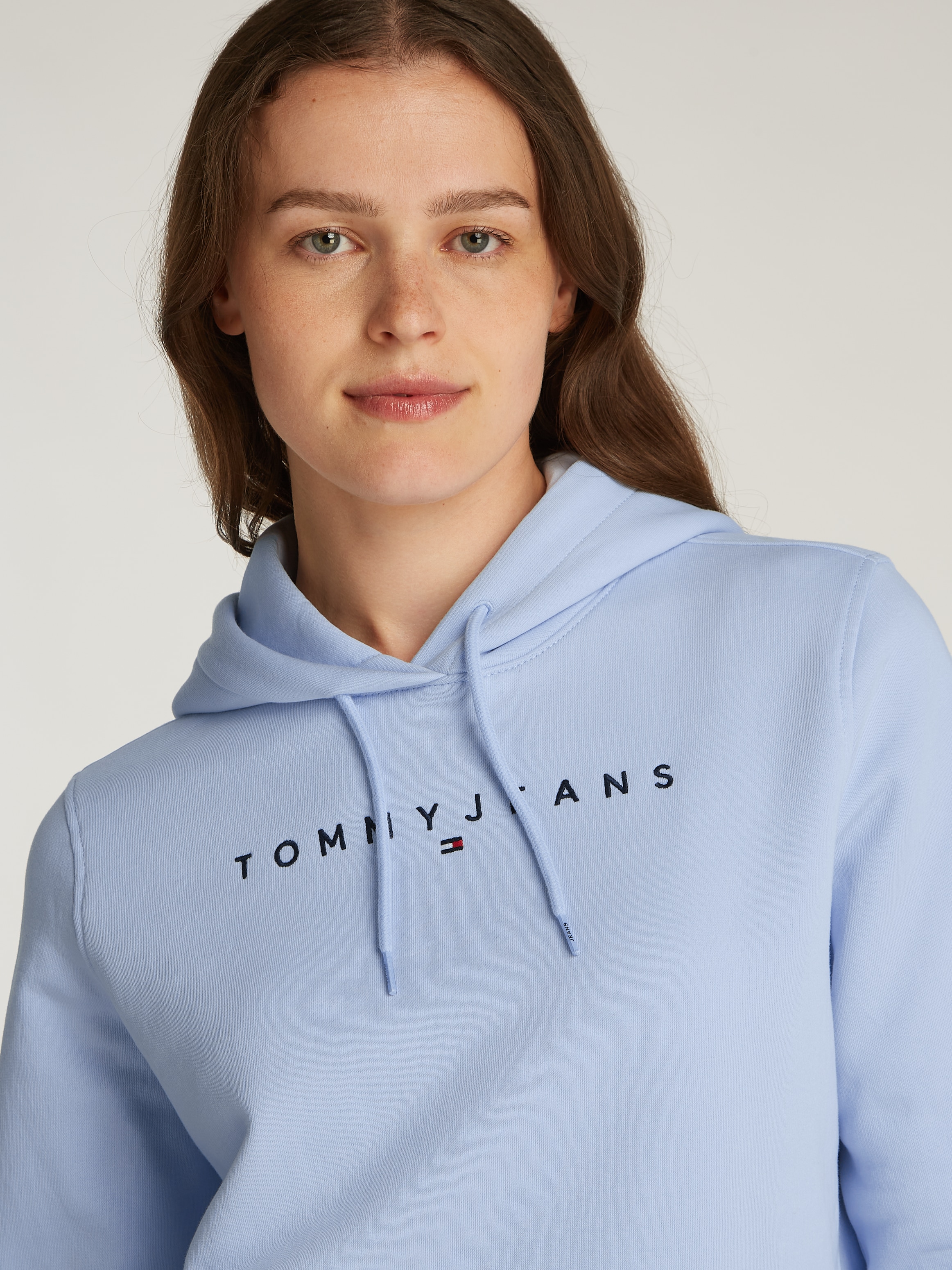 Tommy Jeans Kapuzensweatshirt »TJW REG LINEAR HOODIE«, mit Logoschriftzug
