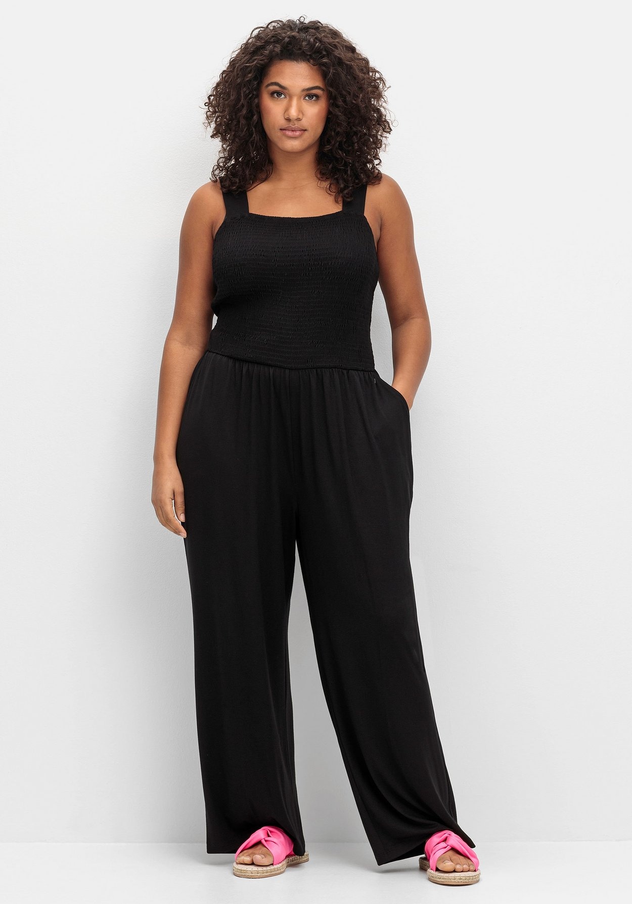 Jumpsuit »Jumpsuit mit Smok-Oberteil und weitem Bein«, mit Smok-Oberteil und weitem Bein