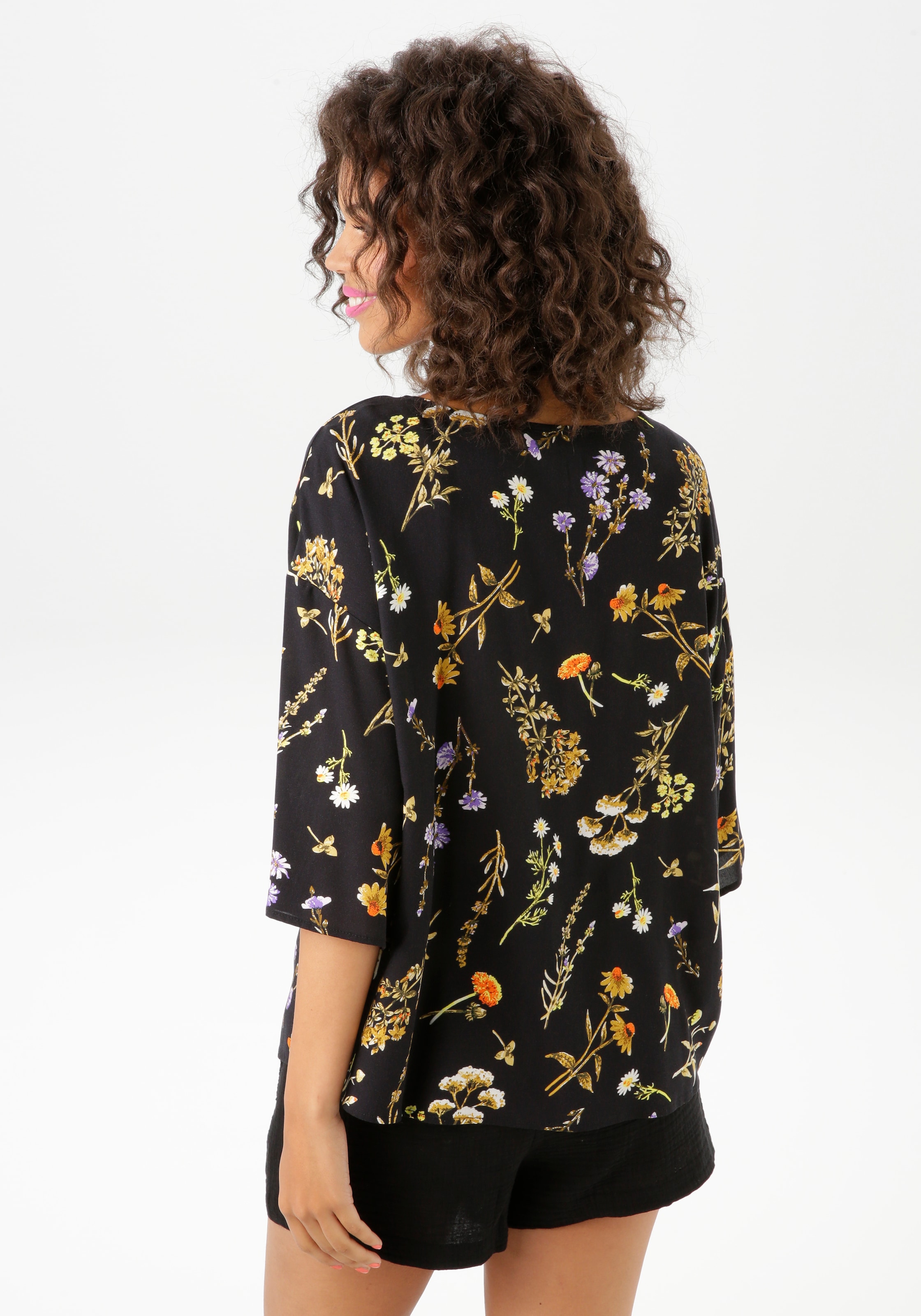 Aniston CASUAL Schlupfbluse, mit farbharmonischen Blumendruck