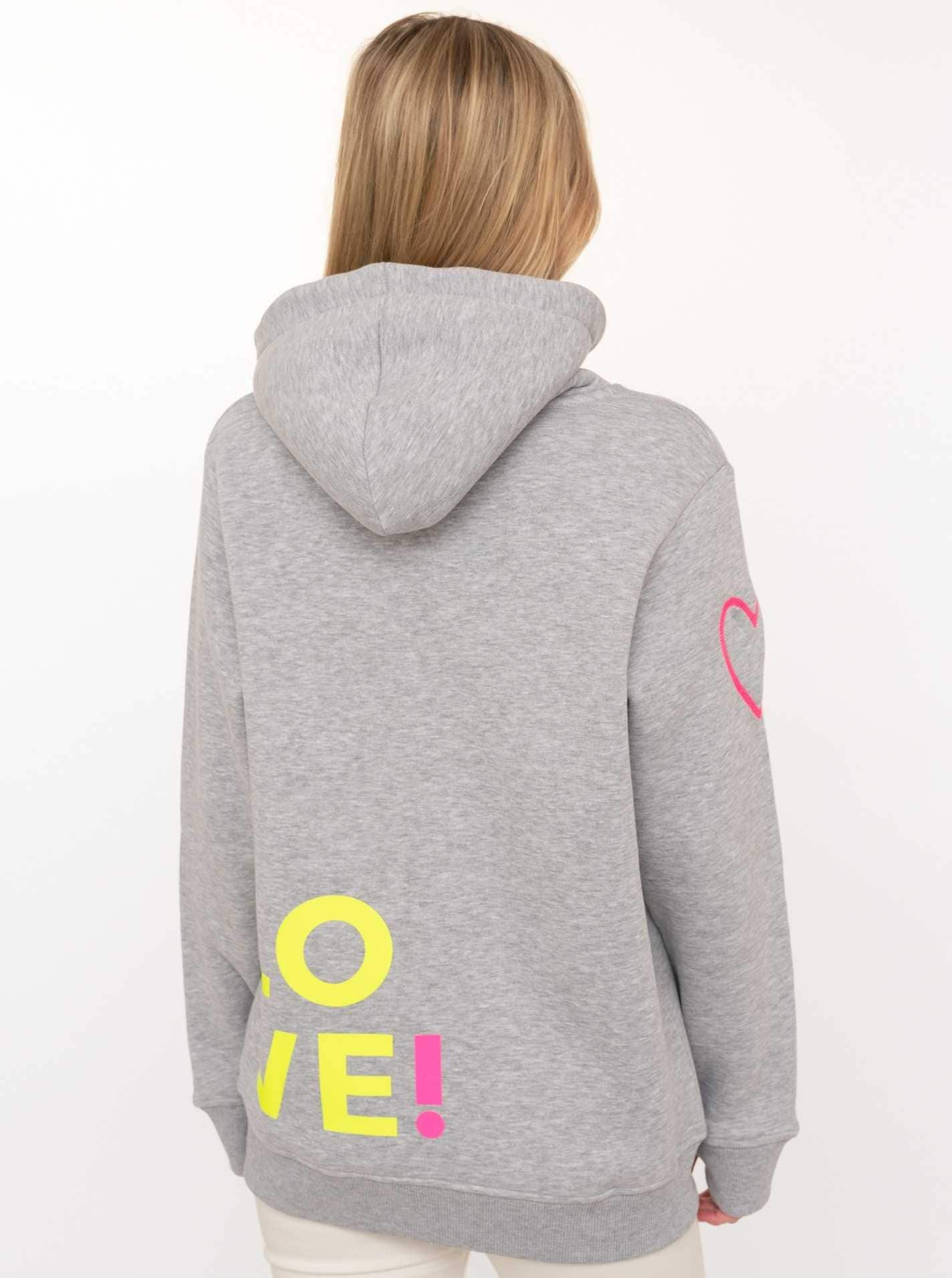 Zwillingsherz Kapuzensweatshirt , mit gesticktem Neon Herz am Ärmel und "Love" Schriftzug auf Kordel
