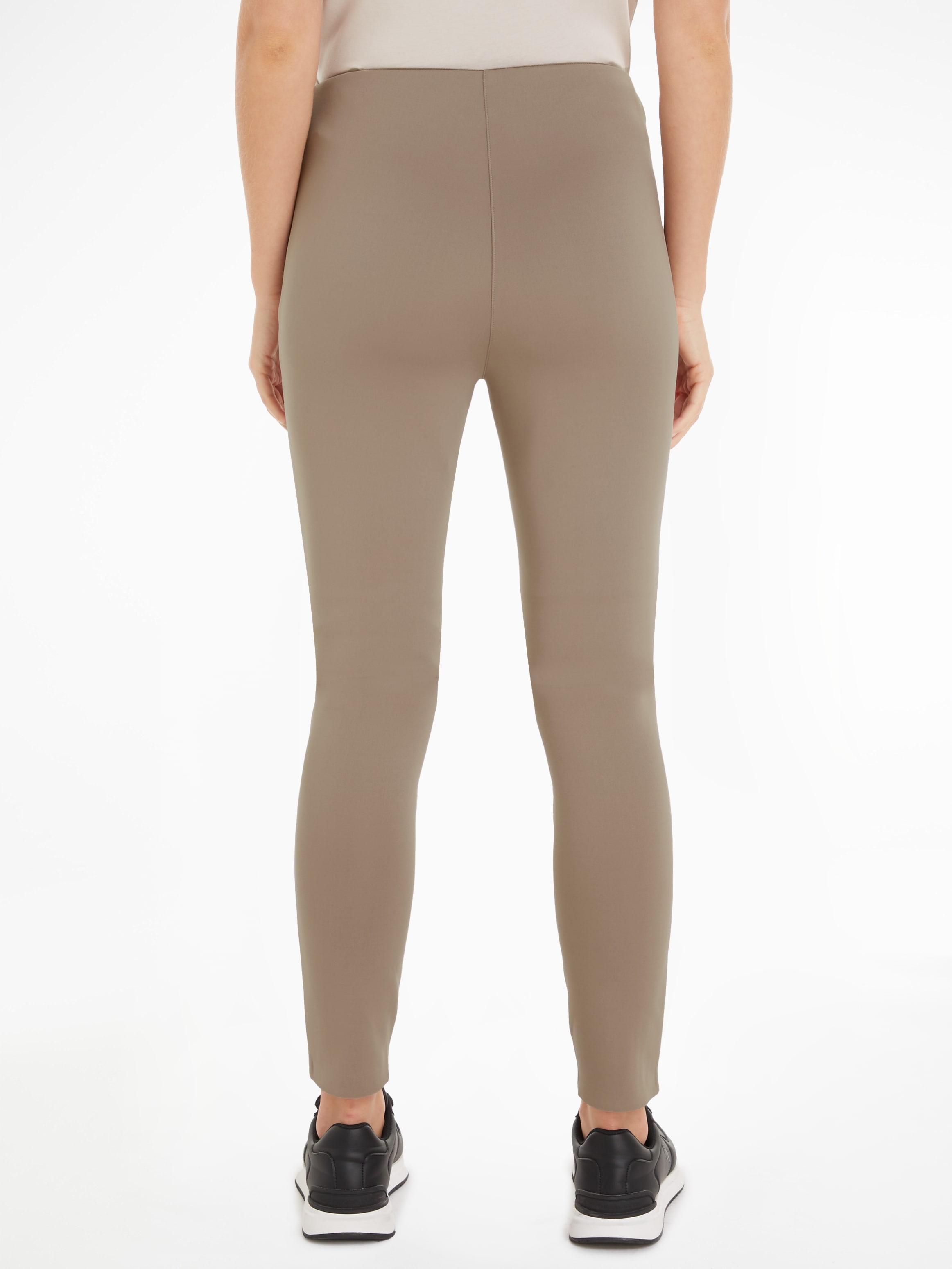 Calvin Klein Leggings »TECHNICAL KNIT LEGGING«, mit Reißverschluss am Beinabschluss