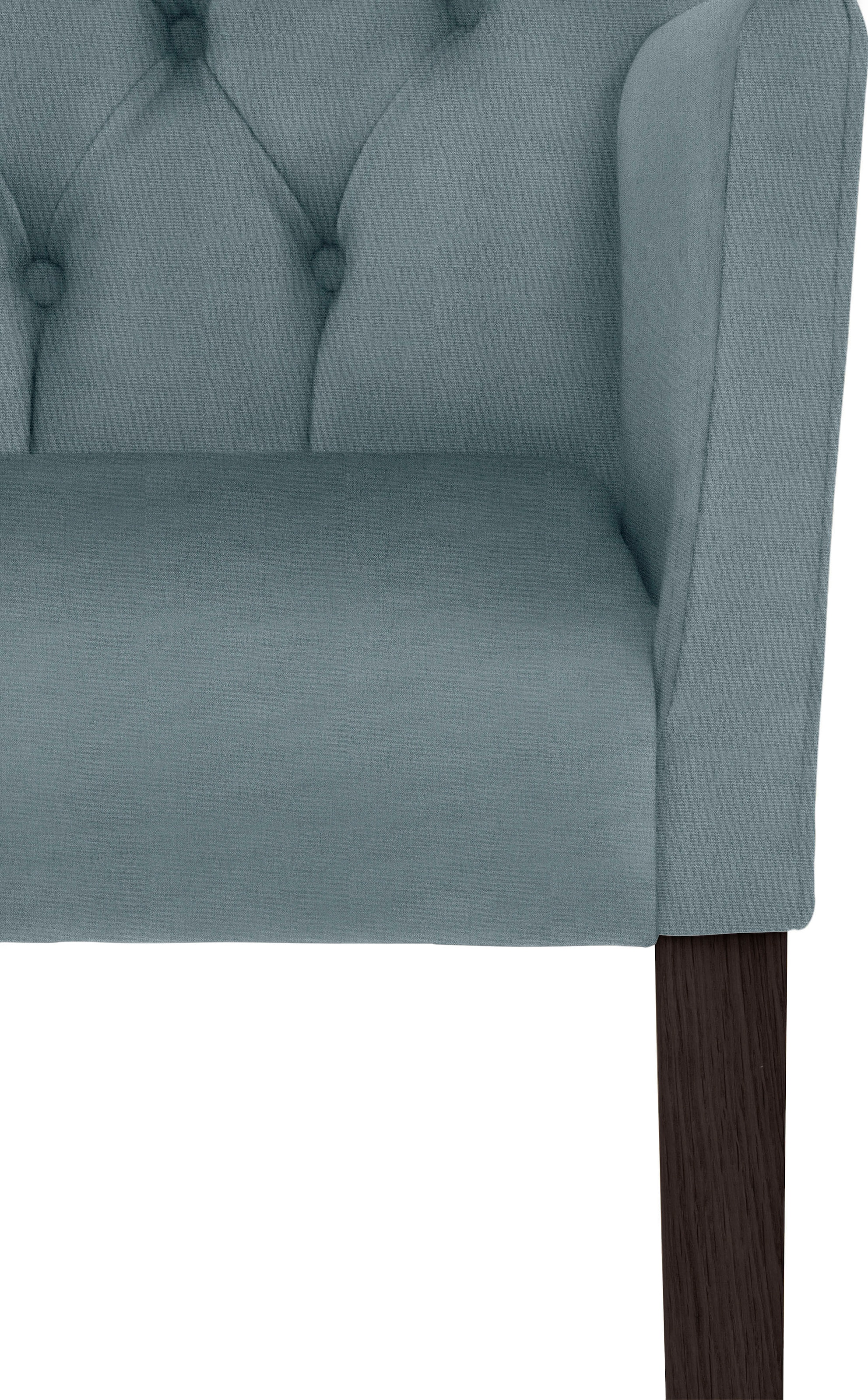 Leonique Armlehnstuhl »Peillon«, Feinstruktur, mit Knopfsteppung, Beine aus massiver  Buche auf Rechnung bestellen