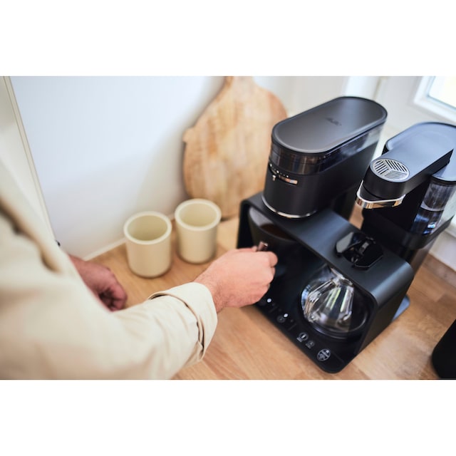 Melitta Kaffeemaschine mit Mahlwerk »EPOS® 1024-03 Schwarz/Silber  360°rotierender Wasserauslauf«, 1 l Kaffeekanne, Papierfilter, 1x4 mit 3  Jahren XXL Garantie