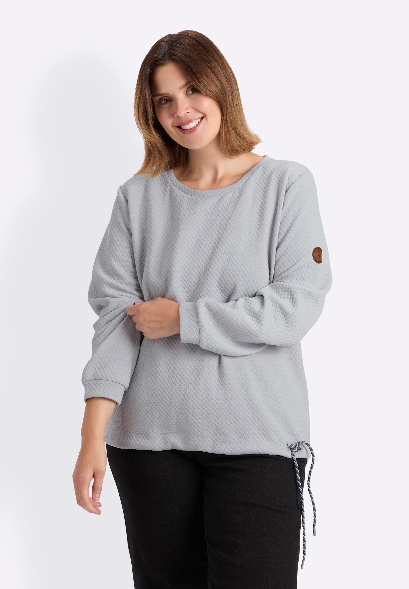 Sheego Sweatshirt »Sweatshirt Sweatshirt mit Ösen und gedrehtem Garn«
