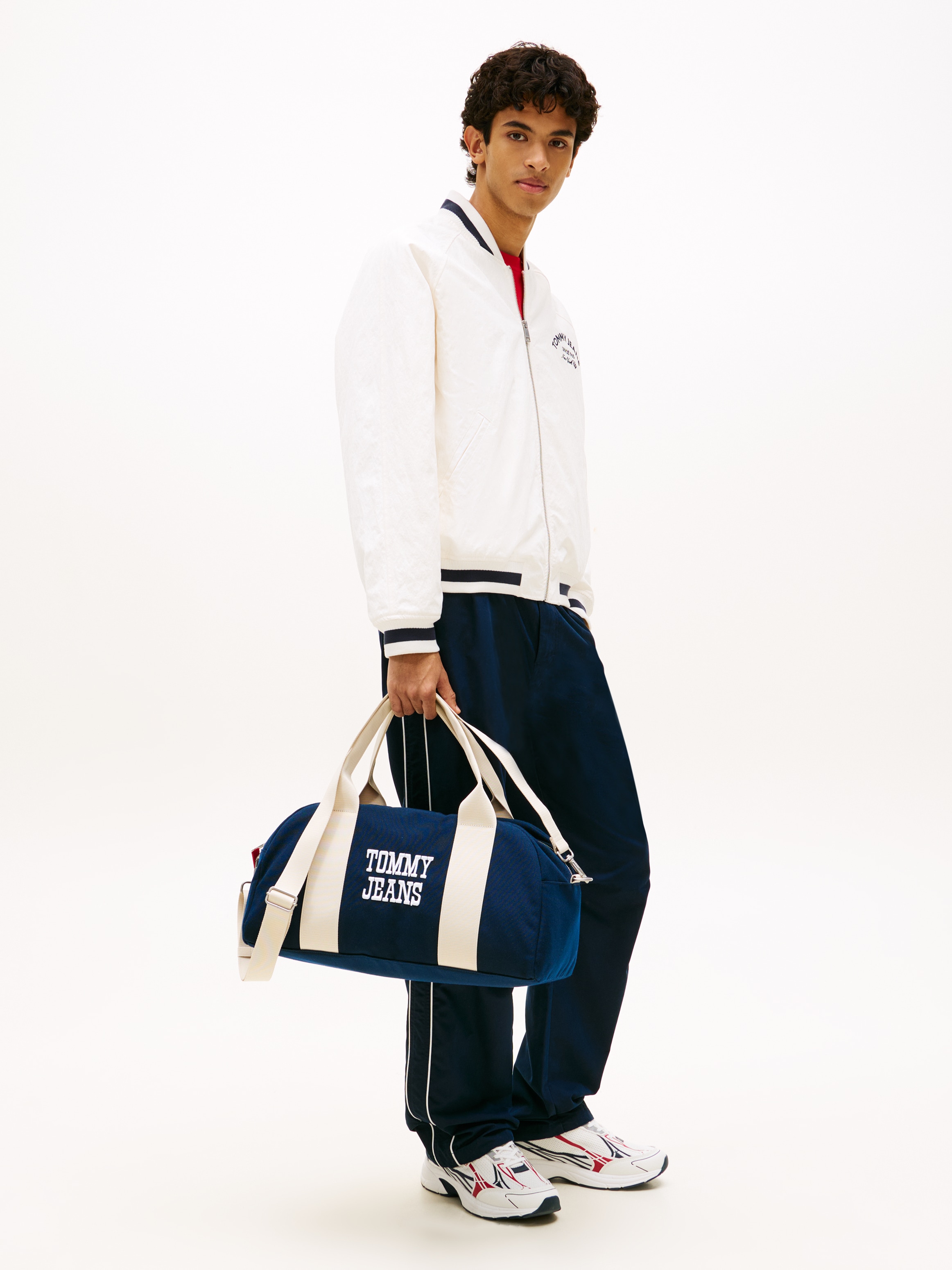 Tommy Jeans Weekender »TJM BOLD VARSITY DUFFLE« Unisex Umhängetasche, Henkeltasche mit Kontrastbesatz