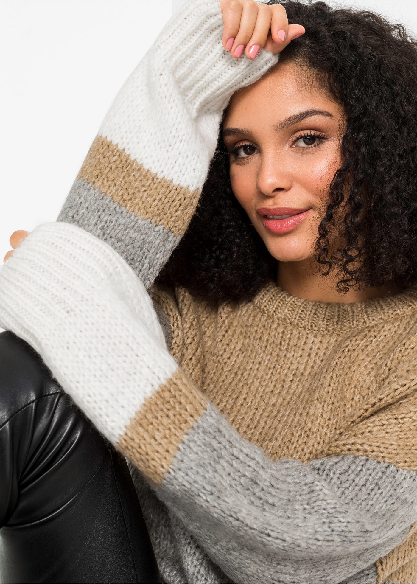 bonprix Strickpullover aus Polyacryl und Polyester, mit Knopfleiste, in Oversize-Passform