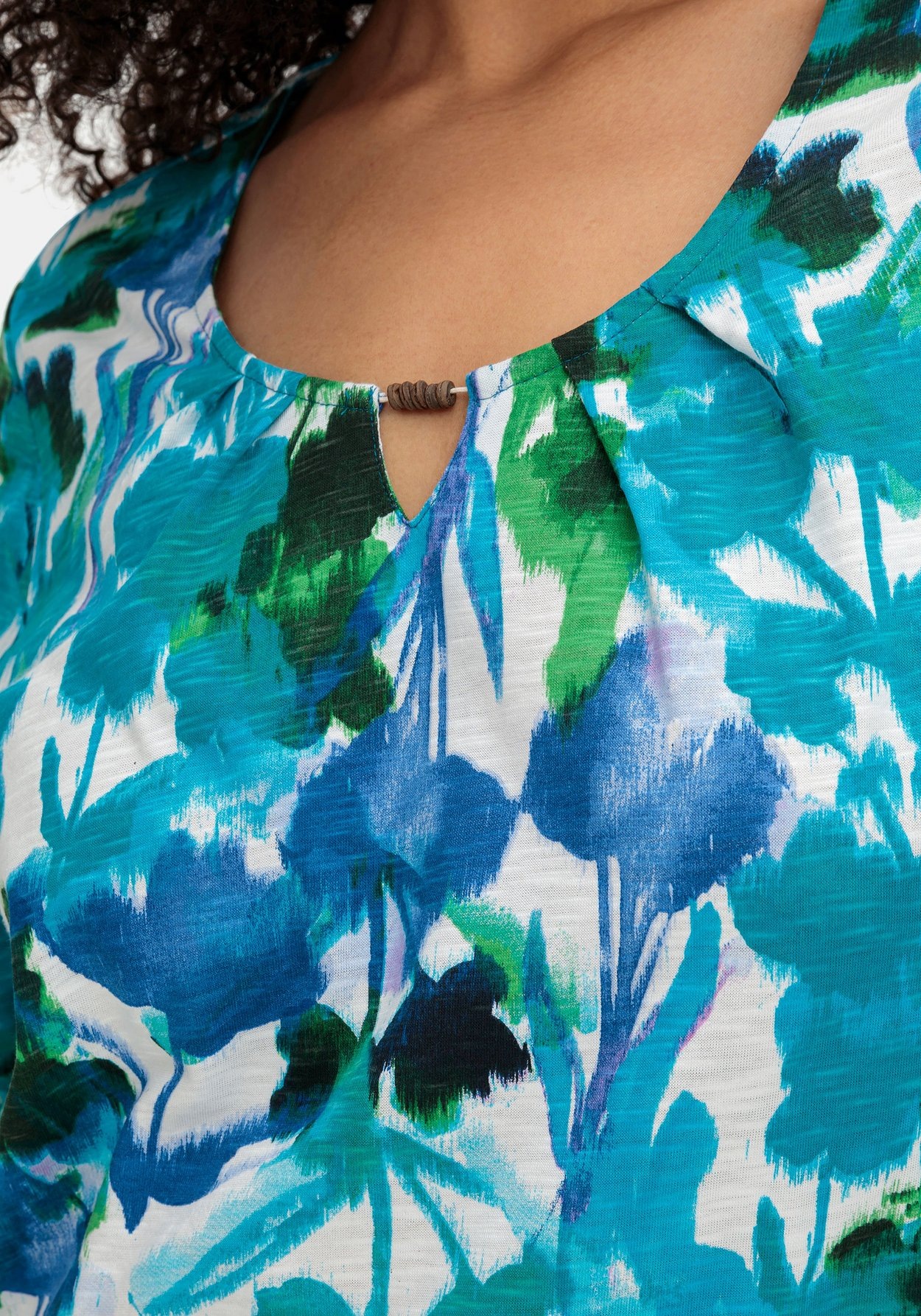 Sheego T-Shirt »Shirt mit Blätterprint und Perlen-Detail«