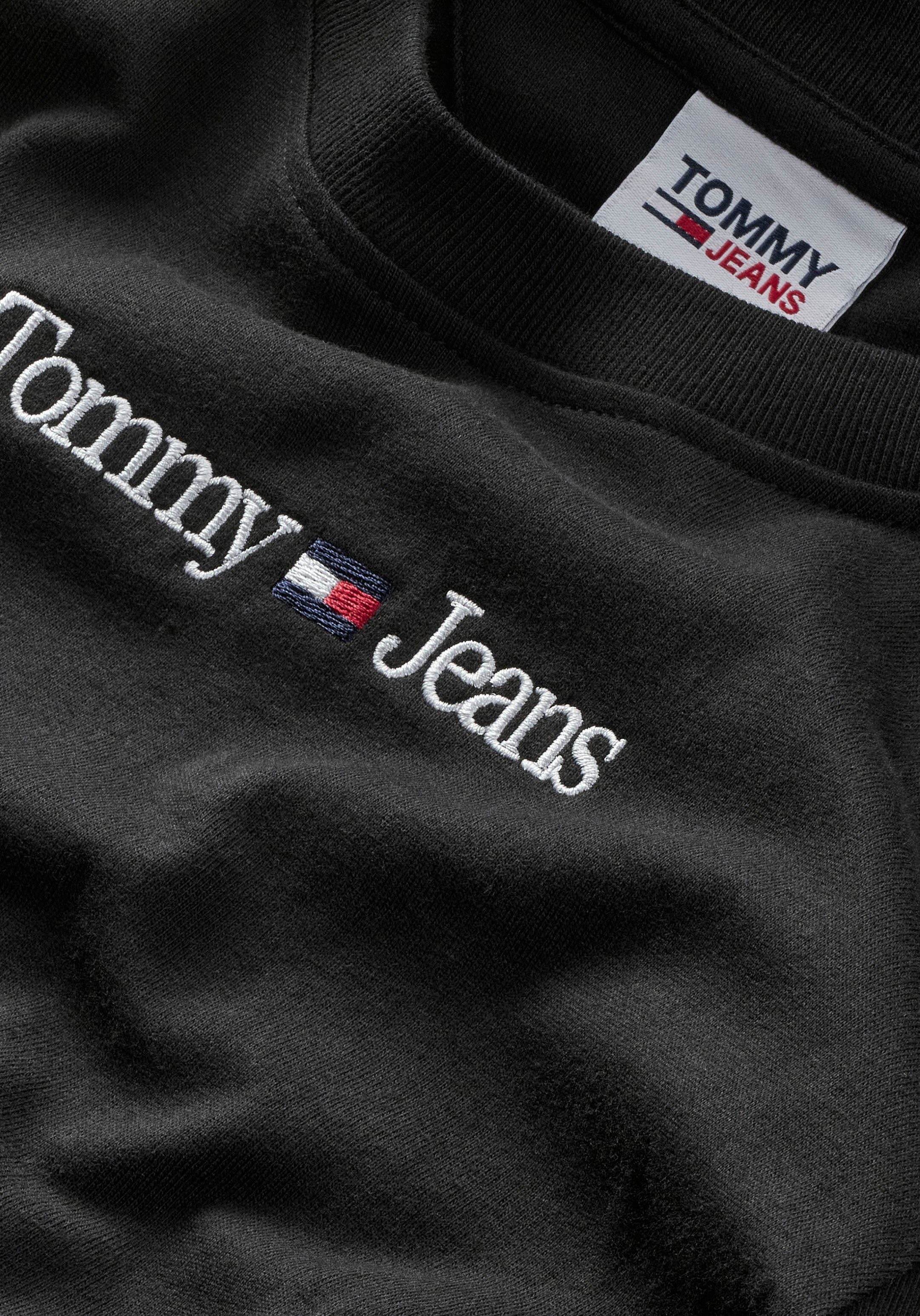 Tommy ♕ SERIF BABY »TJW gesticktem bei mit Langarmshirt LS«, Jeans Tommy Jeans LINEAR Logo-Schriftzug