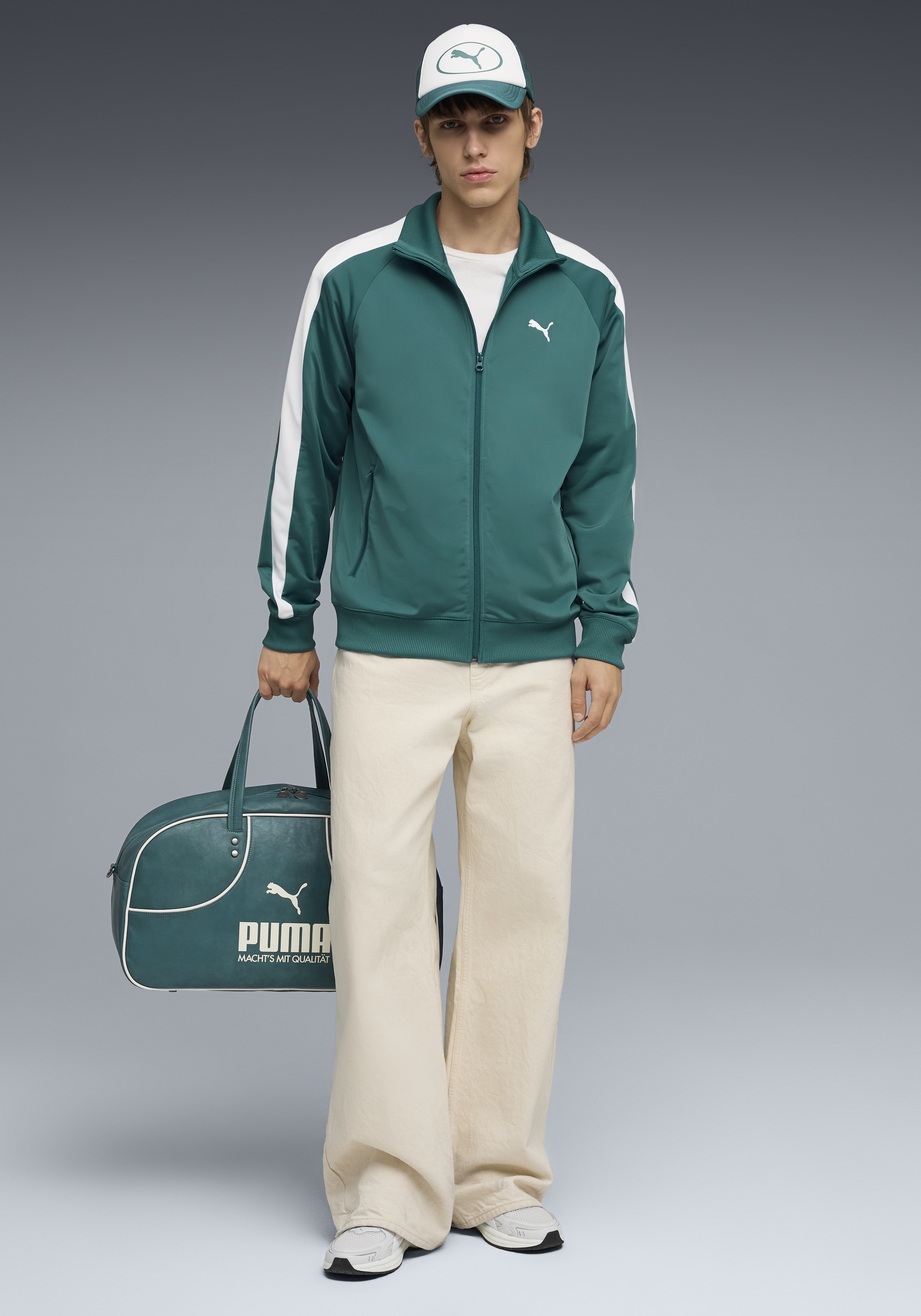 PUMA Trainingsjacke »T7 FOUNDATION POLY TRACK JACKET« ohne Kapuze mit Stehkragen, mit Reißverschlusstaschen, Regular Fit