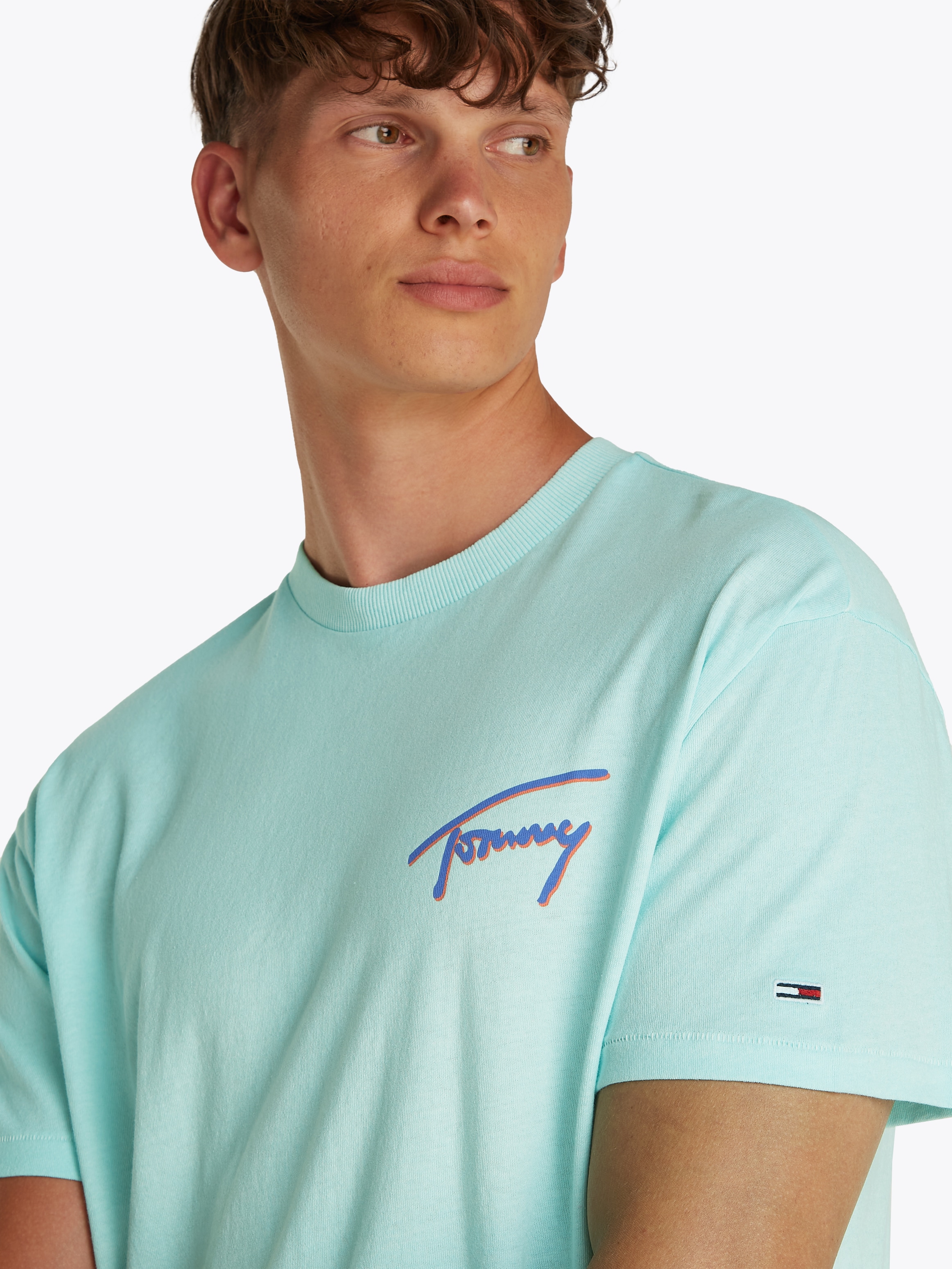 Tommy Jeans T-Shirt »TJM RLX FADED GRAPHIC TEE EXT«, mit großem Rückendruck