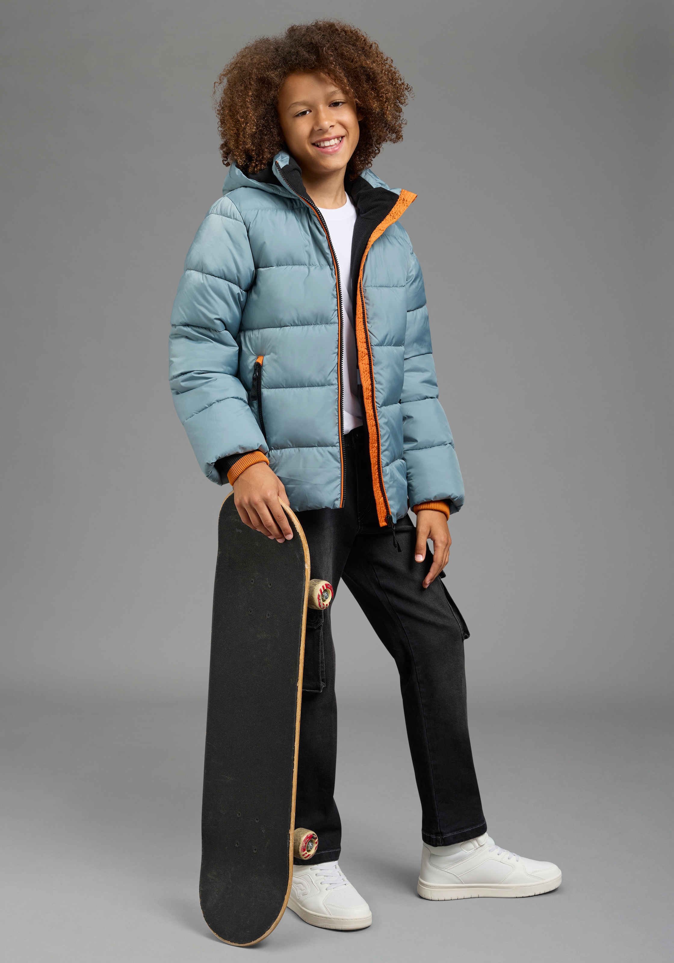 Bruno Banani Outdoorjacke »BRUNO BANANI Steppjacke mit modischen Rib-Bündchen« mit Kapuze Warme Jacke mit Kapuze, Fleecefutter, windabweisend, wasserabweisend