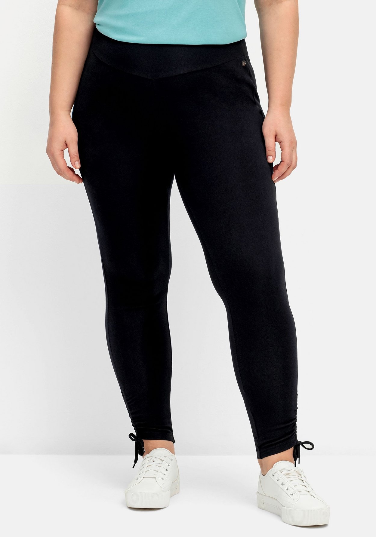 Sheego Leggings »Leggings mit breitem Bund und Raffung am Saum«