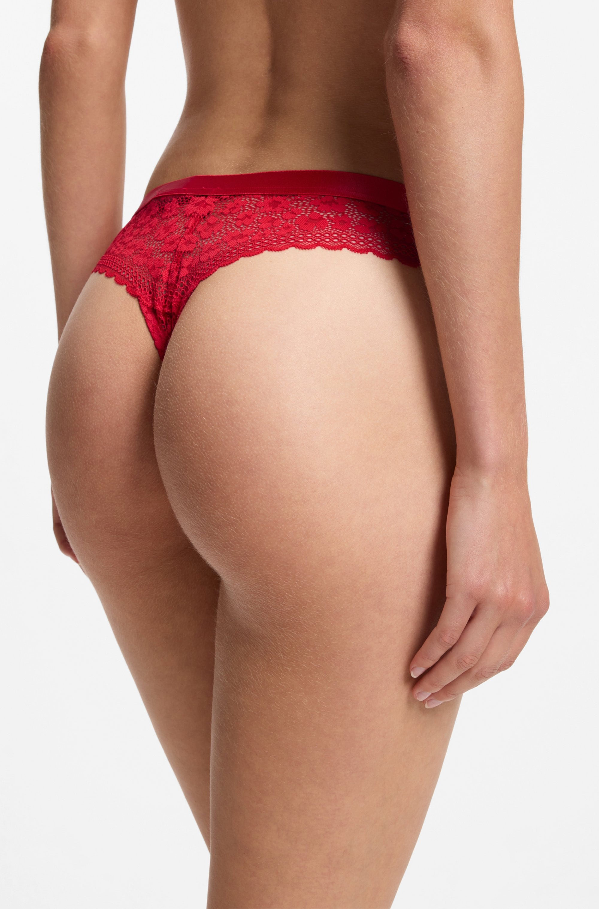HUGO Underwear String »SAVANA« aus Spitze mit Leopardenmuster und Logo am Bund