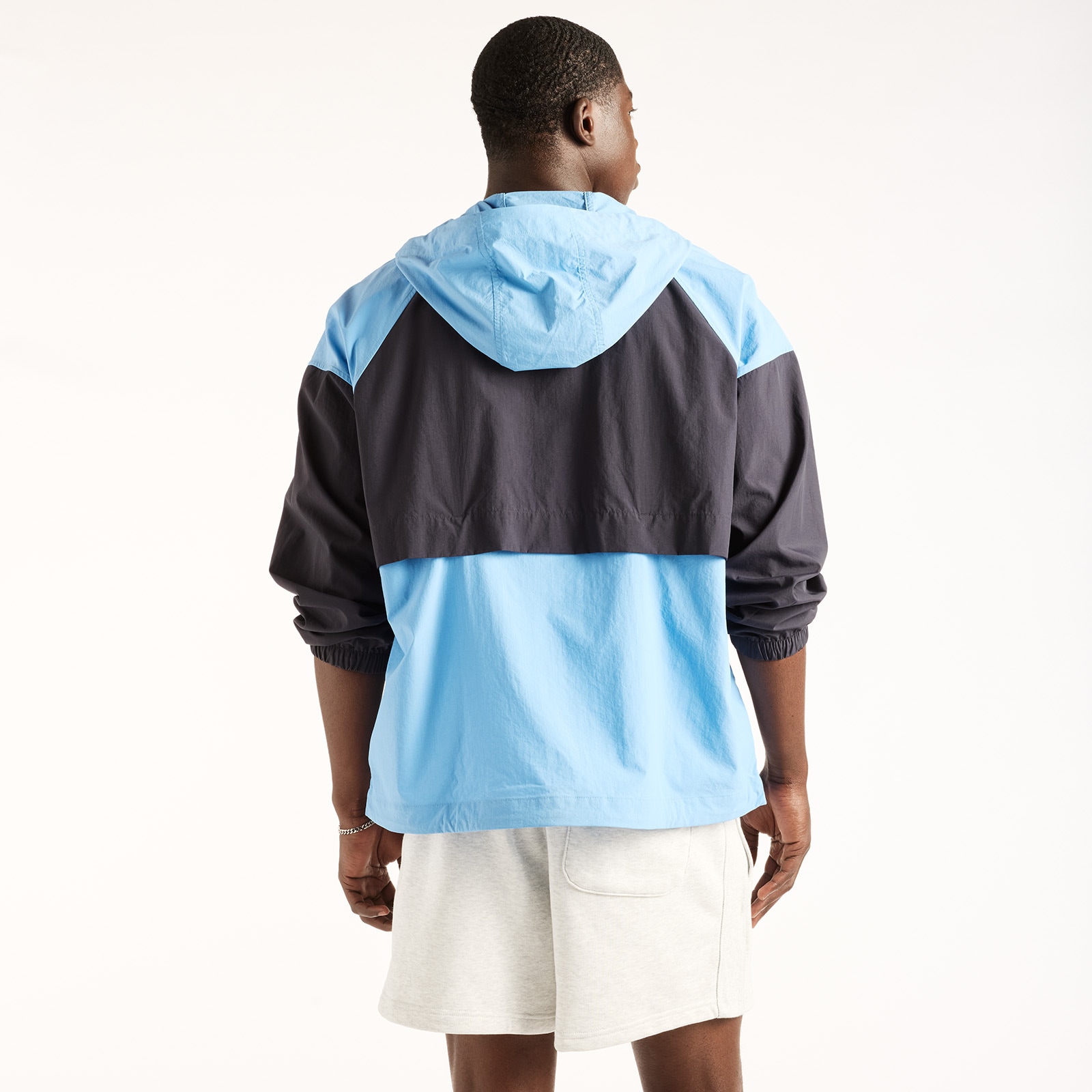 New Balance Windbreaker »SPORT ESSENTIALS FZ JACKET« mit Kapuze Oversized geschnittene Windjacke, wasserabweisend