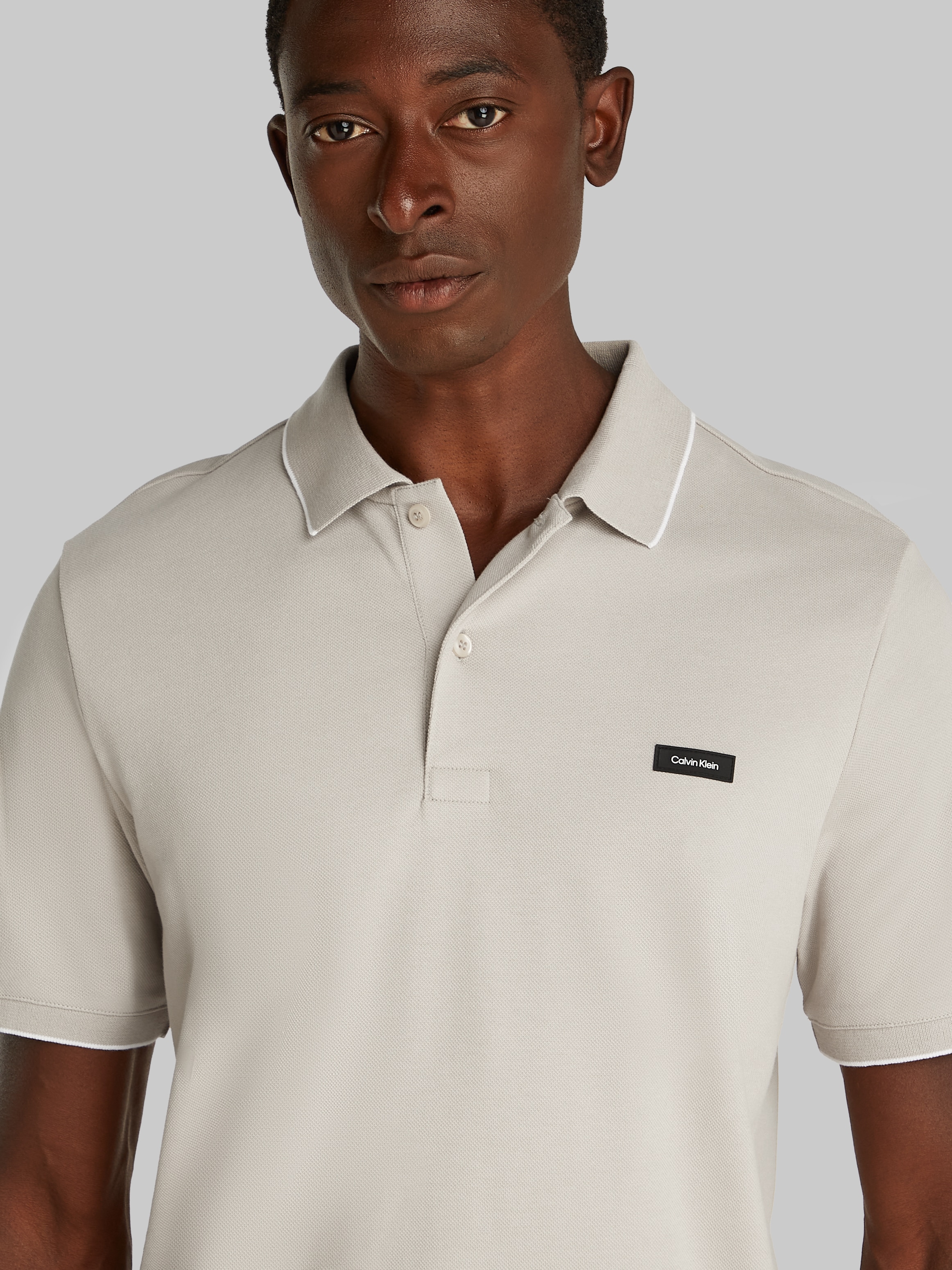 Calvin Klein Poloshirt »STRETCH PIQUE TIPPING POLO«, mit Streifendetail am Kragen