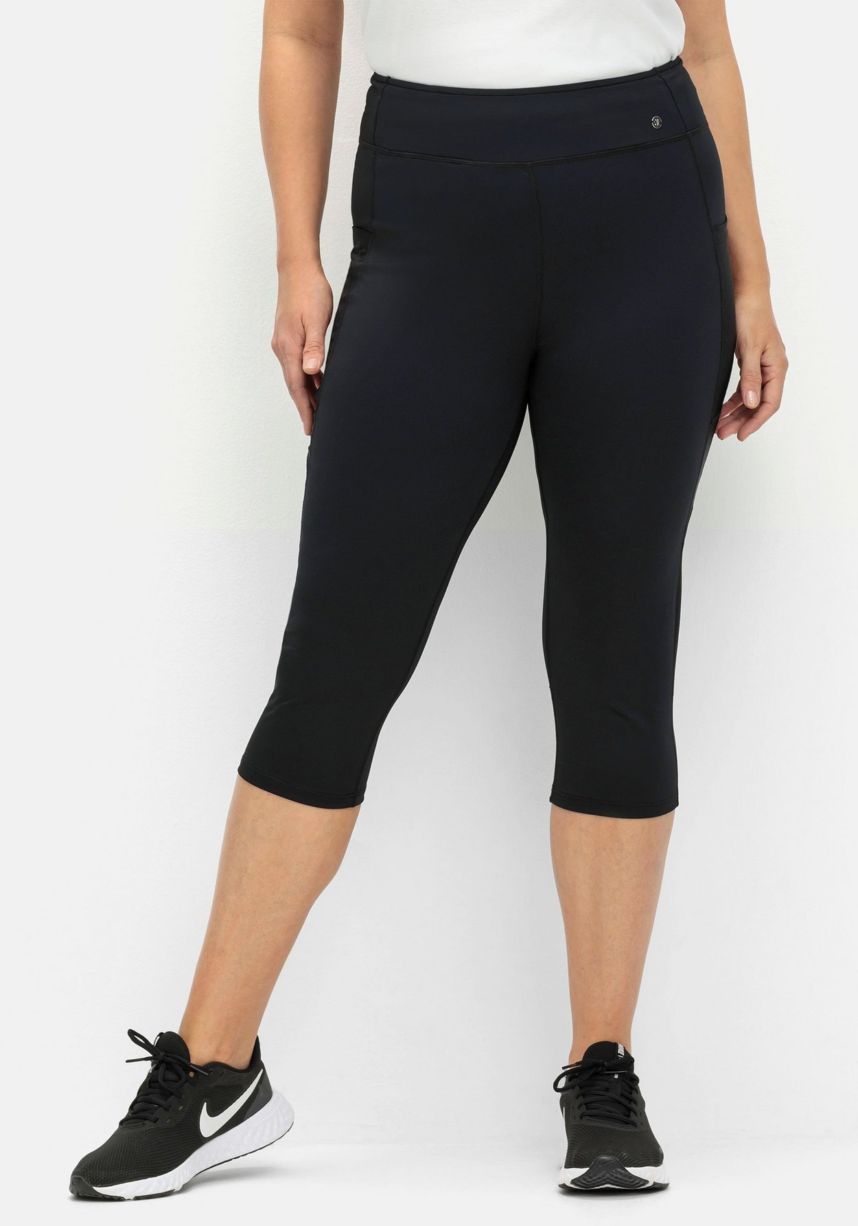 Sheego Leggings »Sportleggings in Caprilänge, aus Funktionsmaterial«
