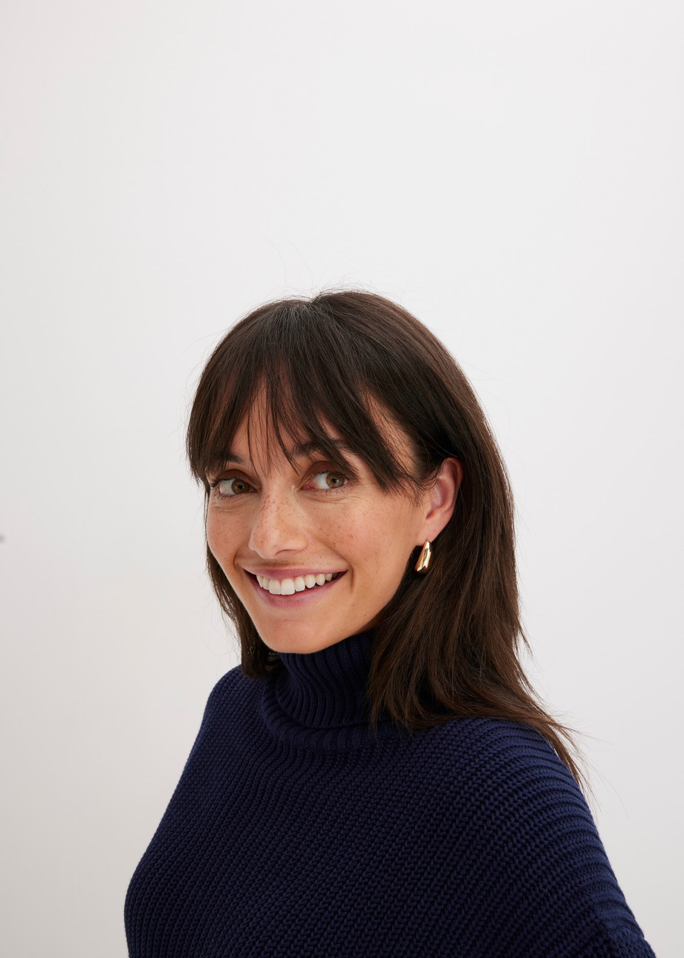 bonprix Rollkragenpullover »Rollkragenpullover aus reiner Baumwolle« im Grobstrick aus Baumwolle, Seitenschlitze, hinten länger geschnitten