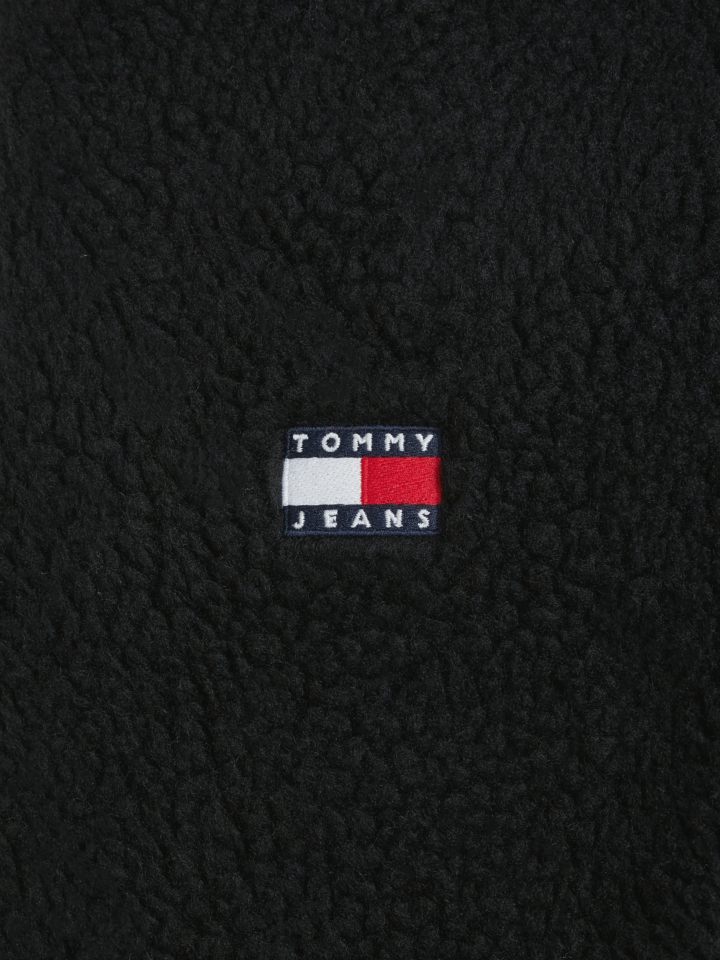 Tommy Jeans Plüschjacke »TJM REG BADGE TEDDY ZIP TRU EXT«, mit Kapuze, mit Logopatch, leicht überschnittene Schultern