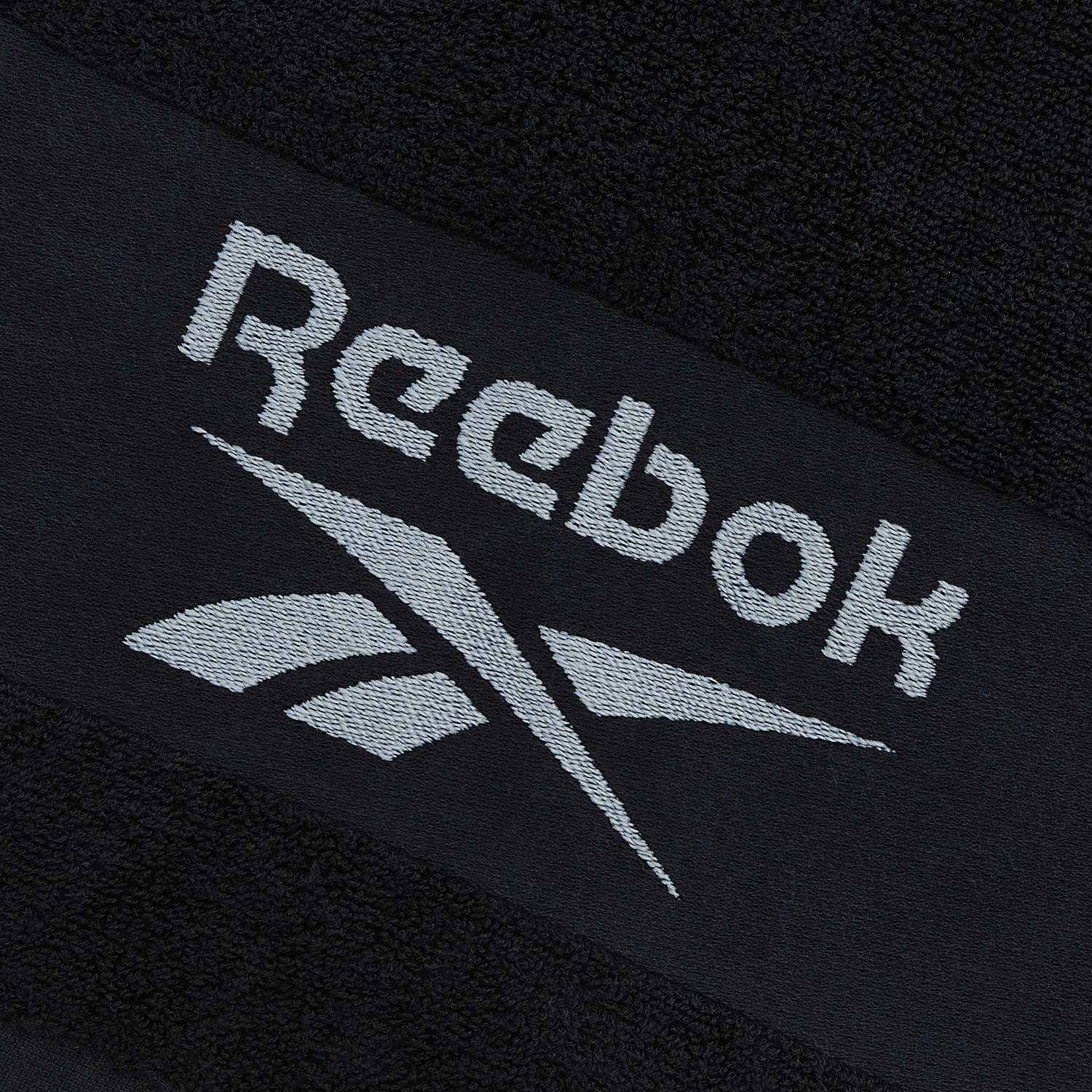 Reebok Sporthandtuch Das markante Reebok-Logo setzt einen sportlichen Akzent.
