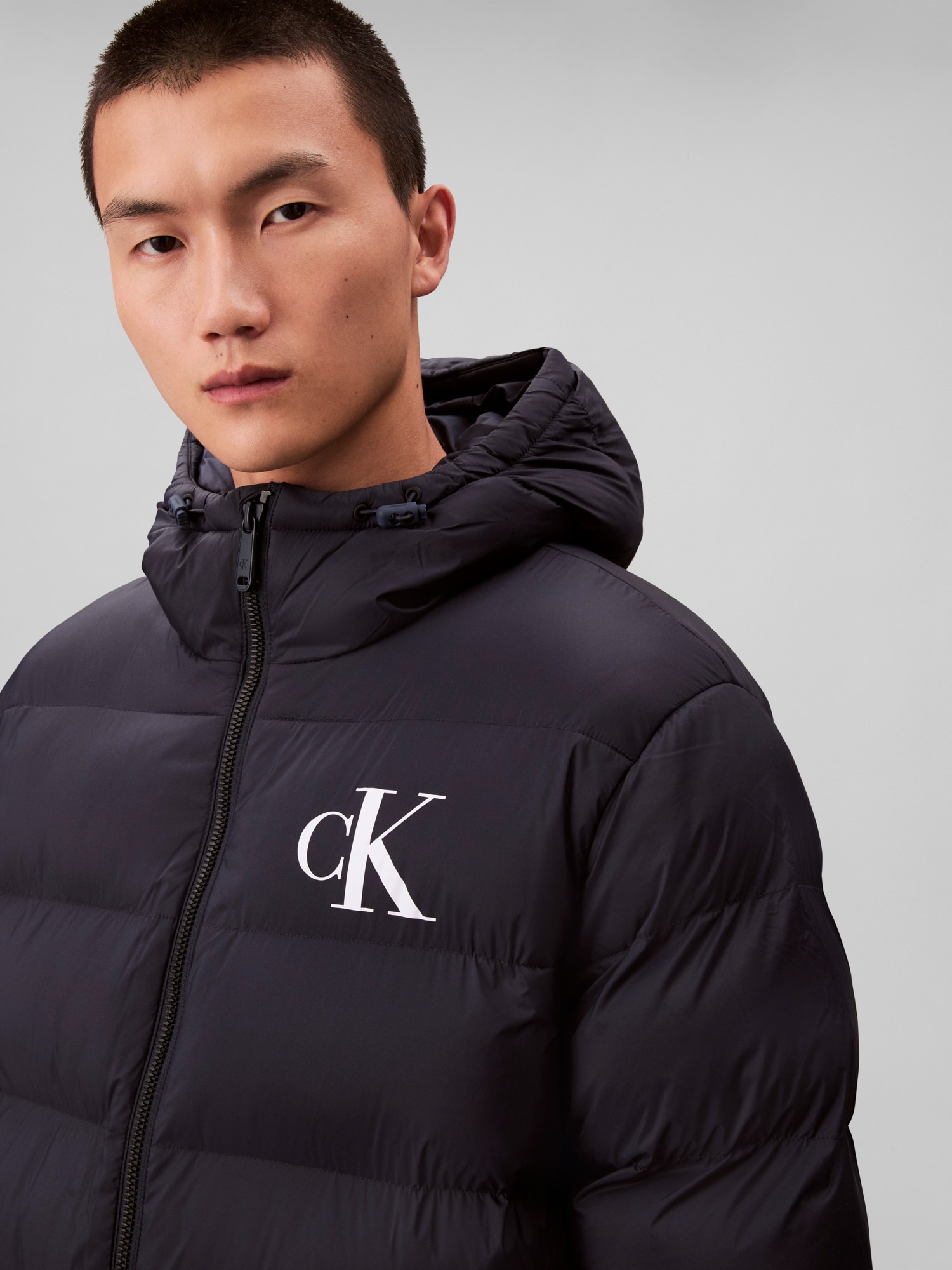 Calvin Klein Jeans Steppjacke »LS NYLON MONOGRAM PUFFER JKT« ohne Kapuze Mit Rundhalsausschnitt, regular fit